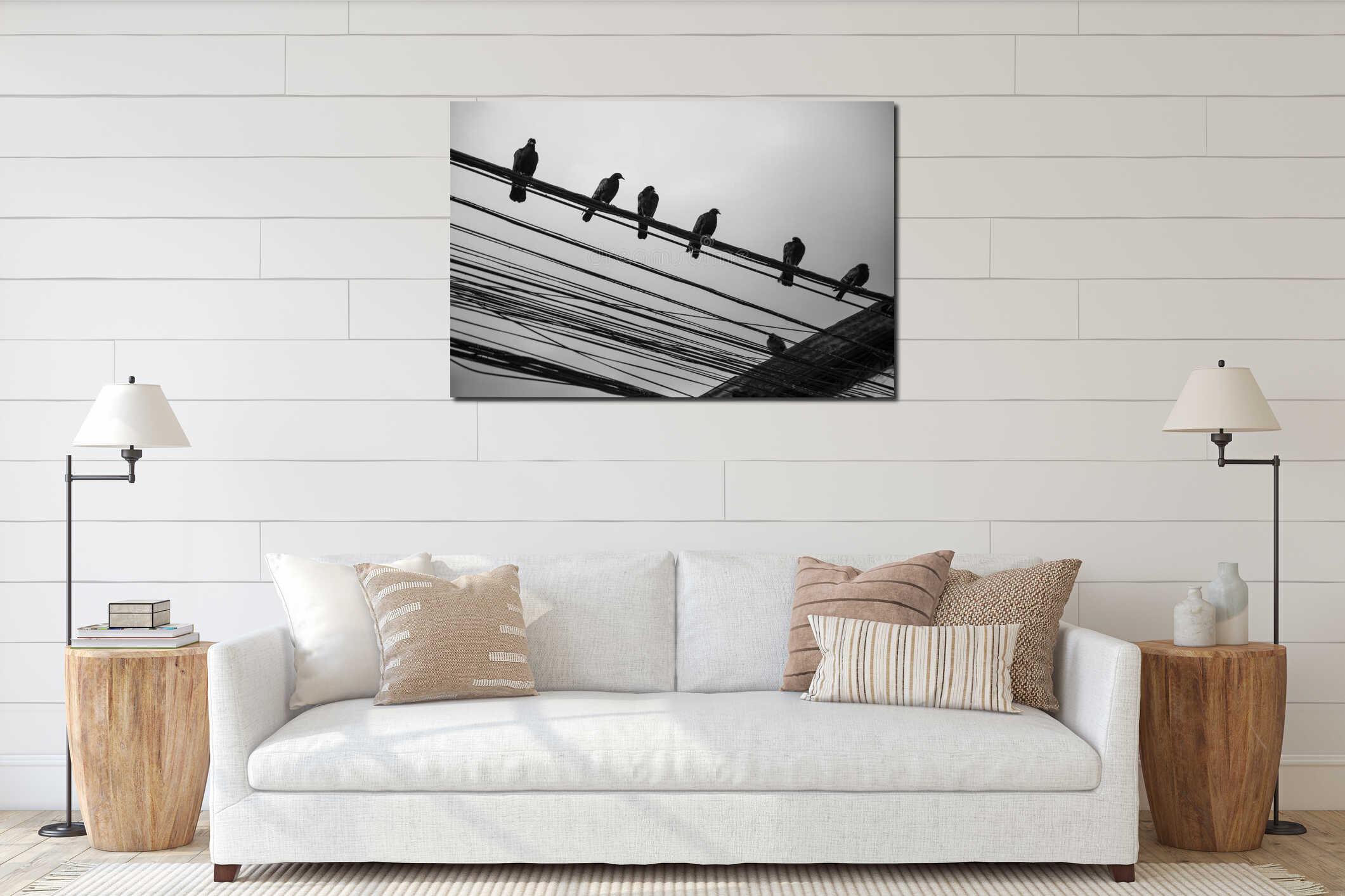 Low angle shot of a flock of birds perched on a wire interior mockup