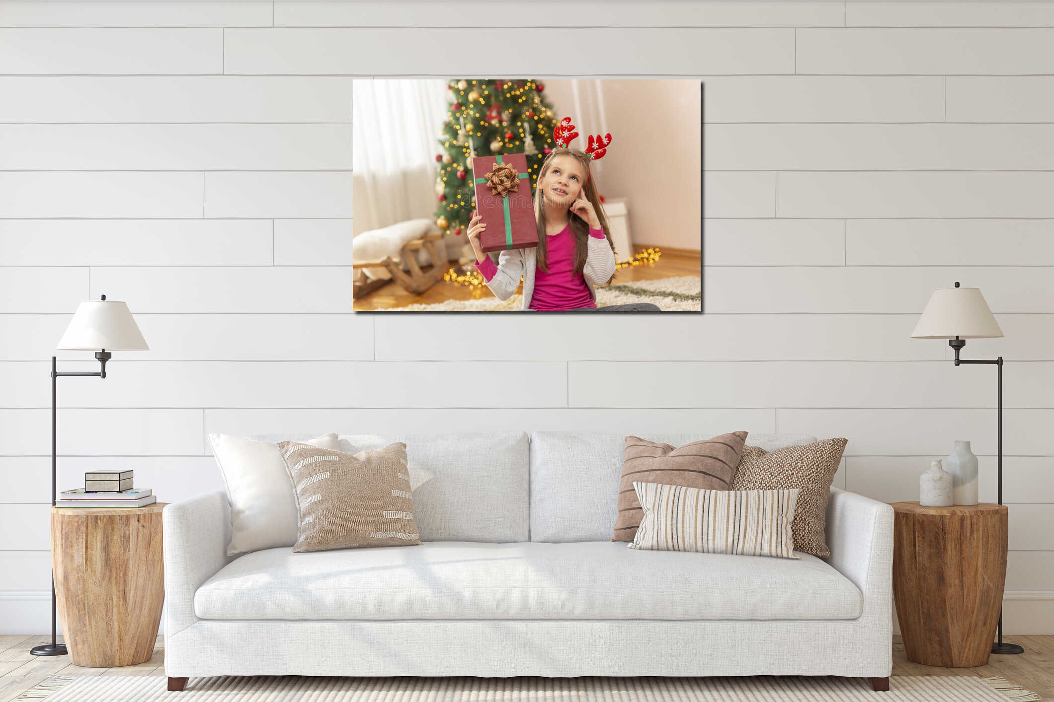 Little girl holding nicely wrapped Christmas present interior mockup