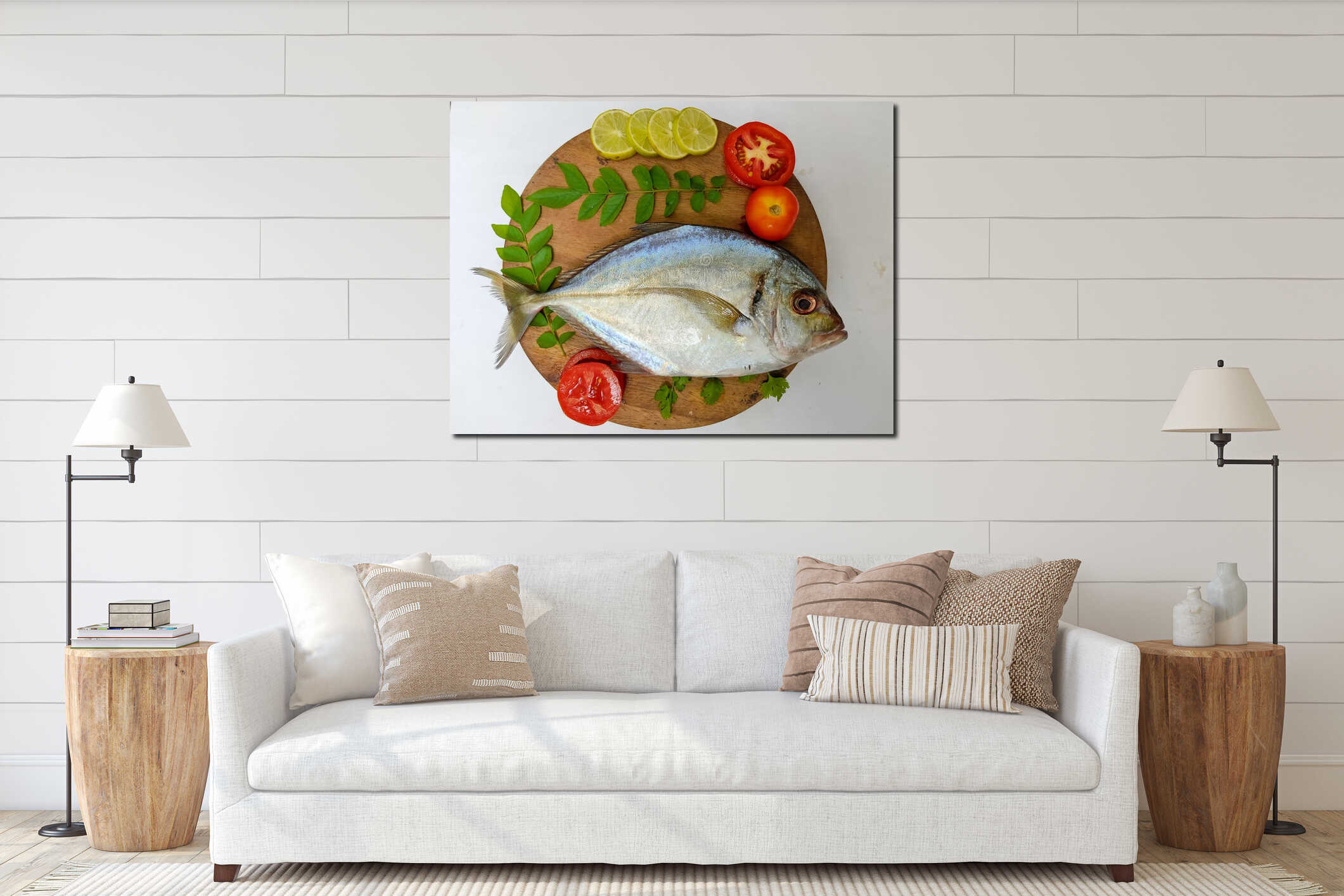 Close up view of fresh Malabar Trevally Fish decorated with curry leaves , tomato,lemon slice and herbs on a white Background interior mockup
