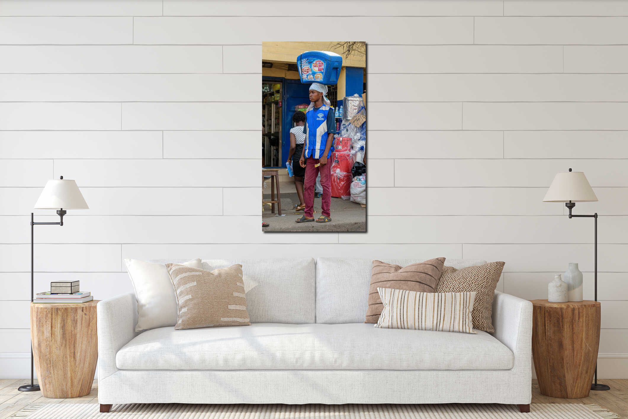 ACCRA,REPUBLIC OF GHANA - APRIL 30,2018:The young man sells ice cream. He holds the refrigerator with the goods on his head interior mockup