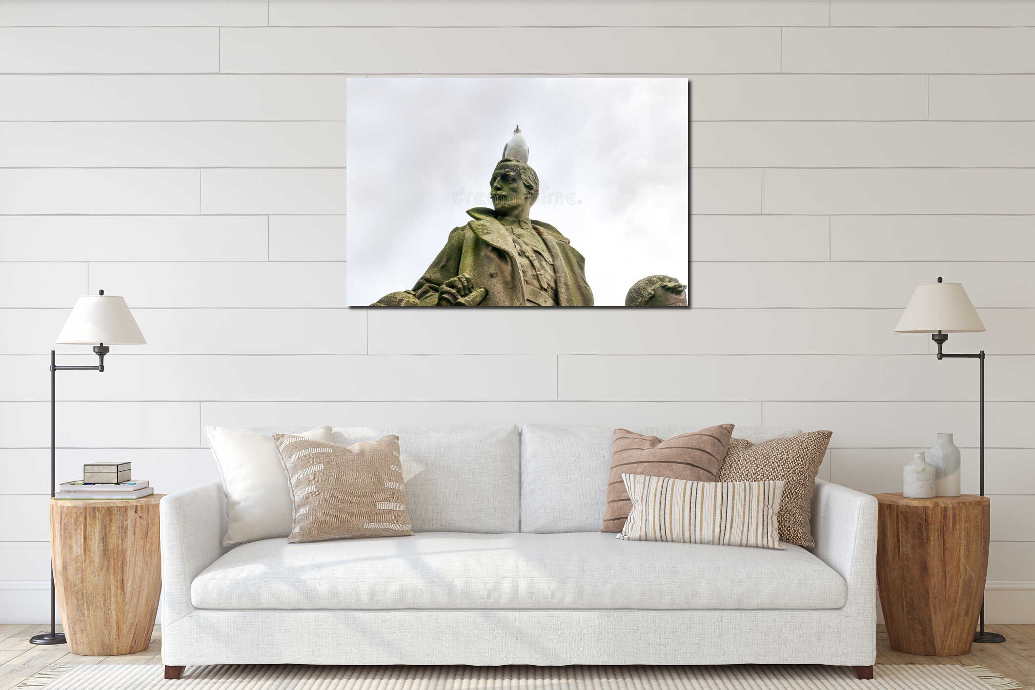 Seagull sitting on war memorial, on the north bridge in Edinburgh interior mockup