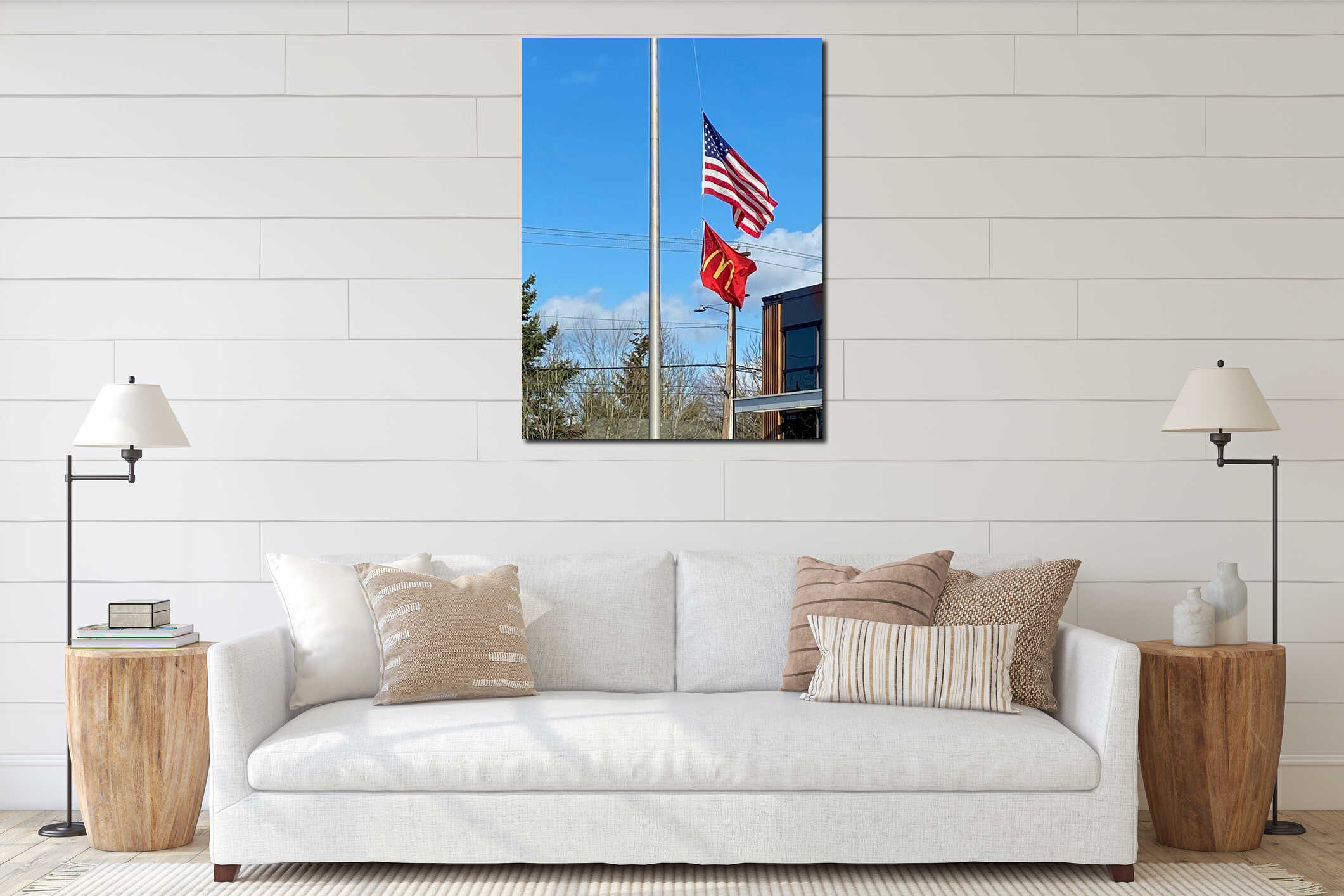 An American Flag Filing half Mast with a McDonalds Flag. interior mockup
