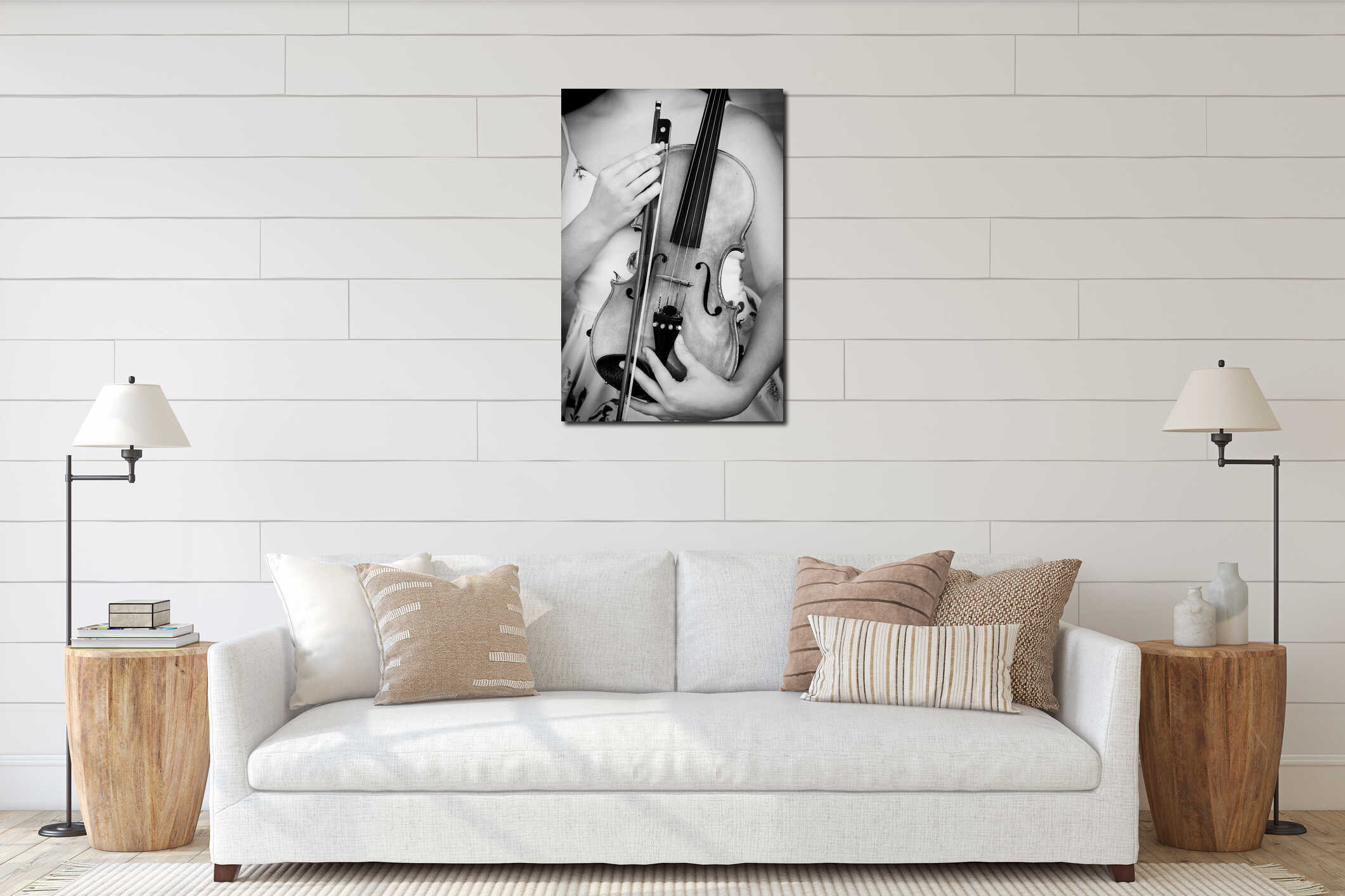 Vertical greyscale shot of a female holding a violin in her arms interior mockup