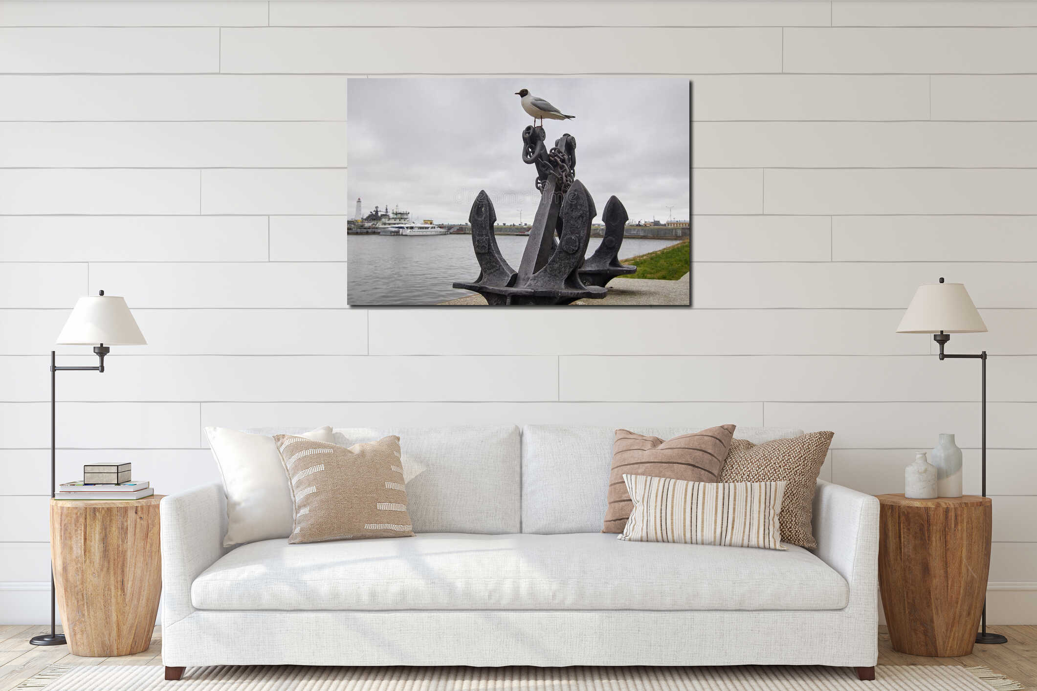 a seagull sits at anchor in the background of the seaport. pier with a lighthouse. gray cloudy sky interior mockup