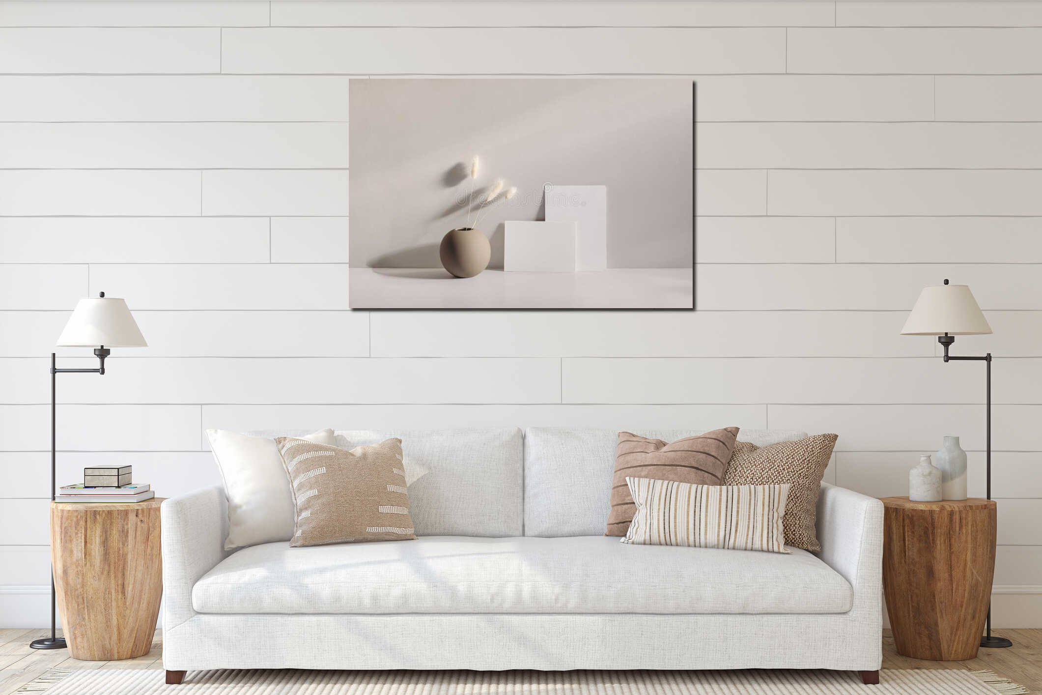 Modern summer stationery still life scene. Beige ball shaped vase with dry lagurus grass. Table background in sunlight interior mockup