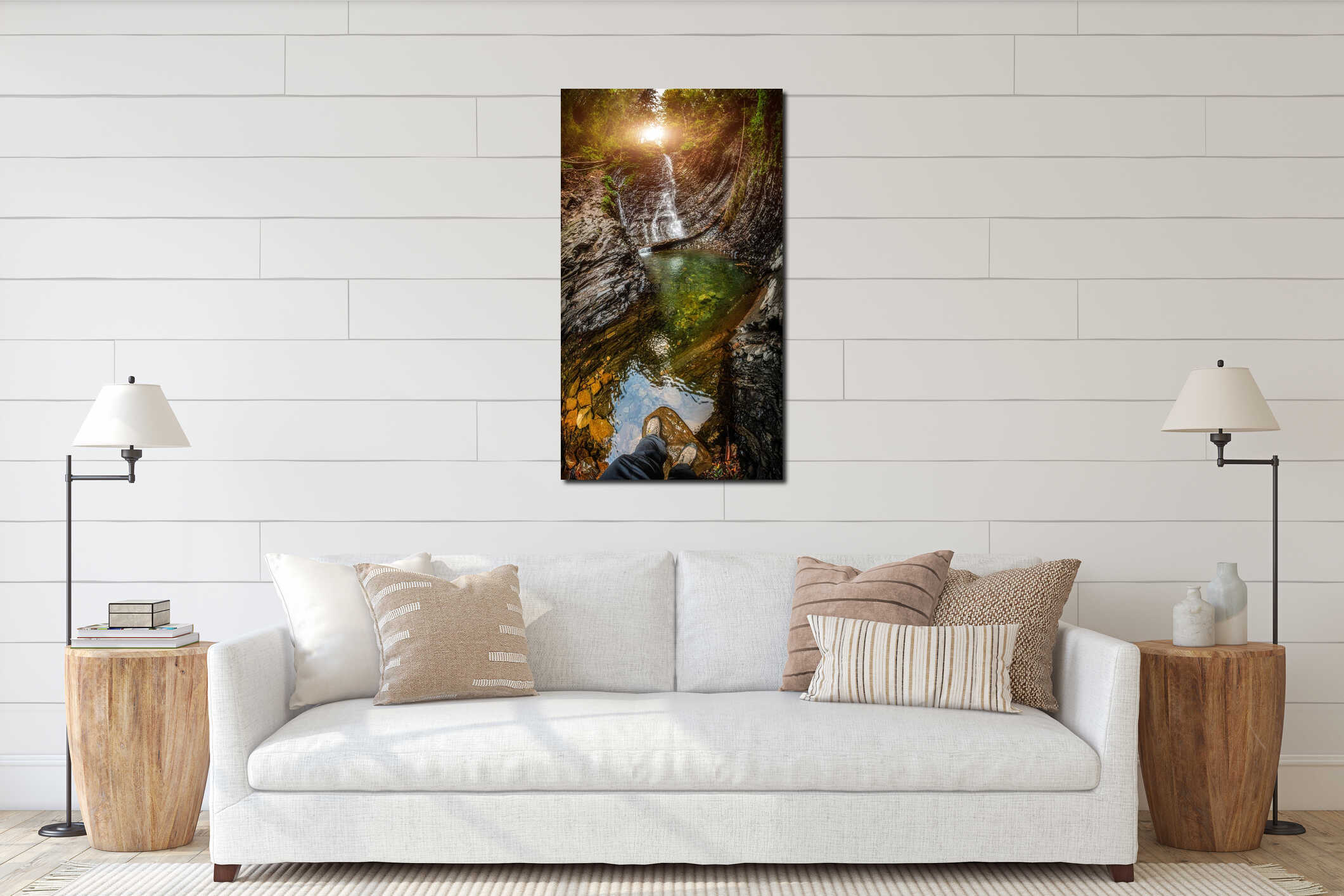 Beautiful waterfall with sunlight in autumn forest. Waterfall vertical panorama. Traveler man stands in front of waterfall river interior mockup