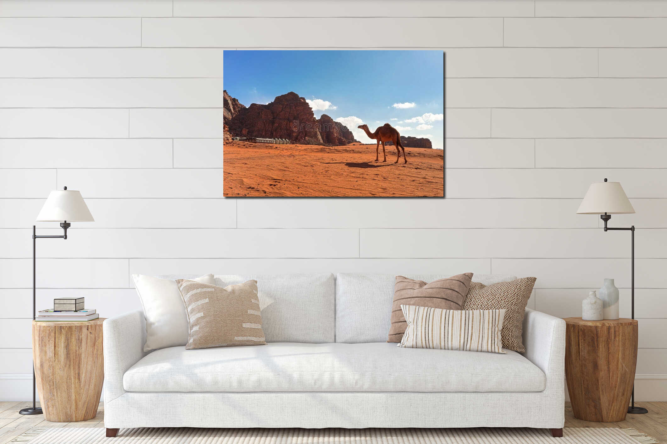 Camel walking on orange red sand of Wadi Rum desert, tent camp under mountains background interior mockup