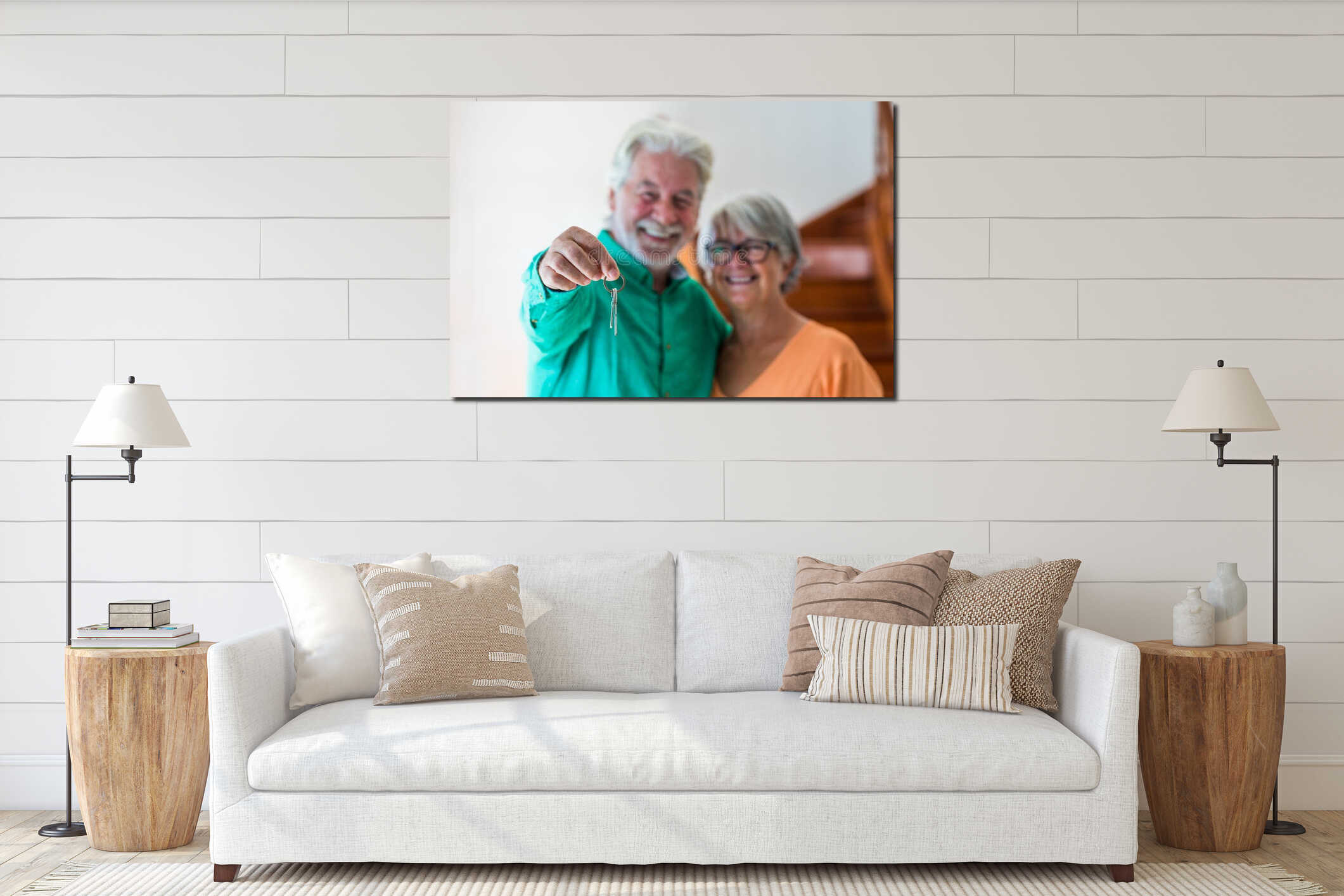 Portrait and close up of two happy seniors buying a new house holding the key with his hand interior mockup