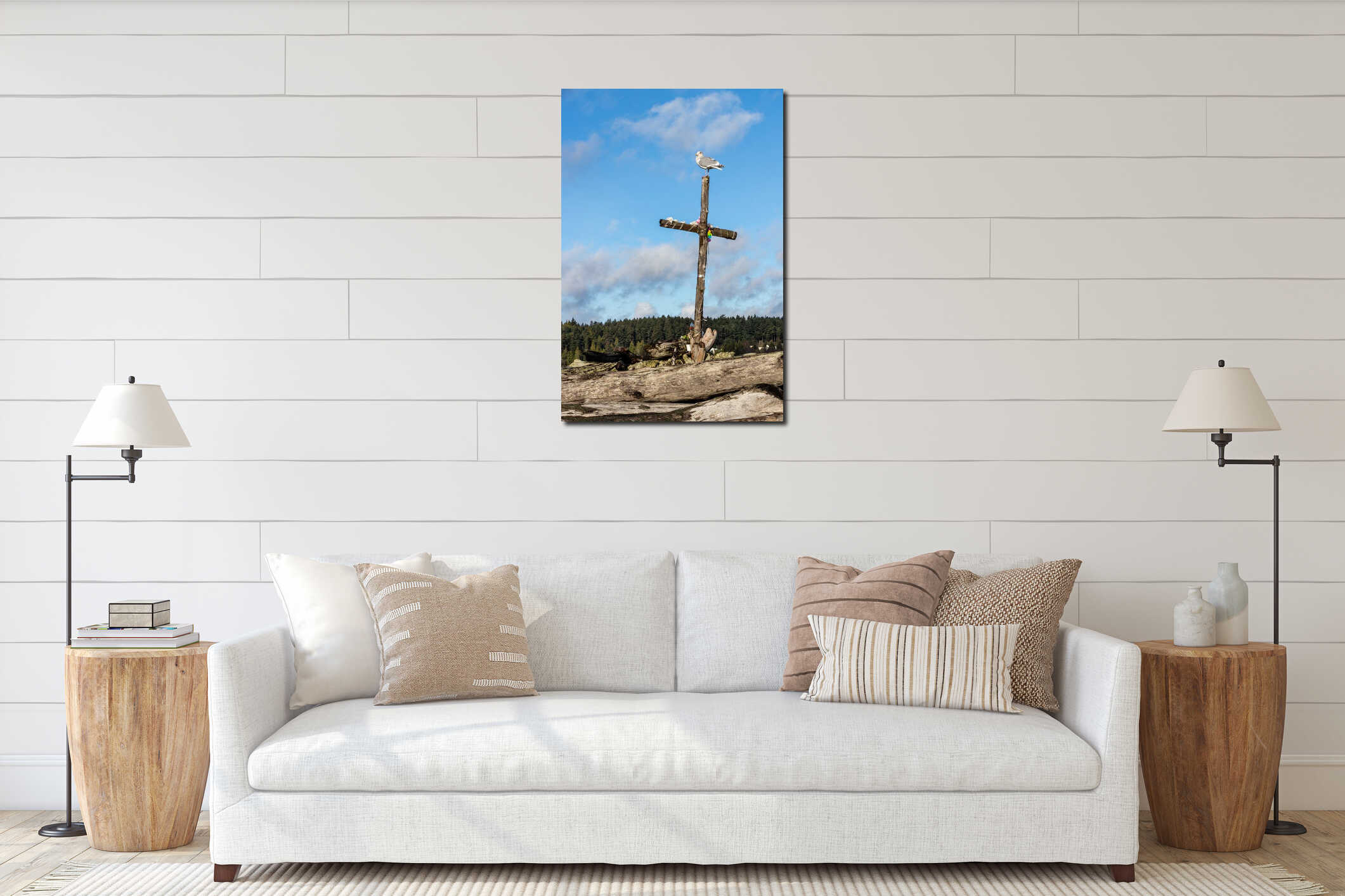 Seagull standing on a wooden cross on the beach interior mockup