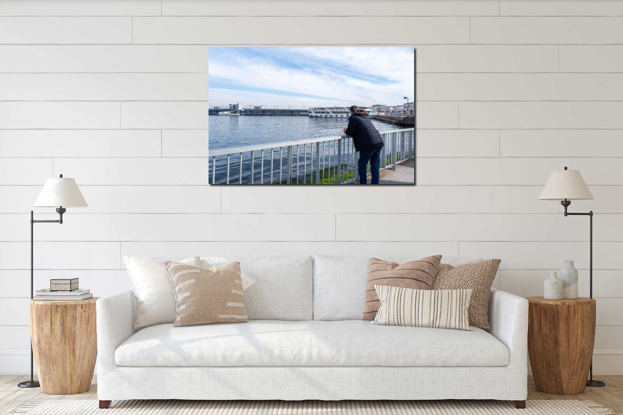 A male person standing on a fence of coast under bright air in Winter time in Istanbul, Turkey interior mockup