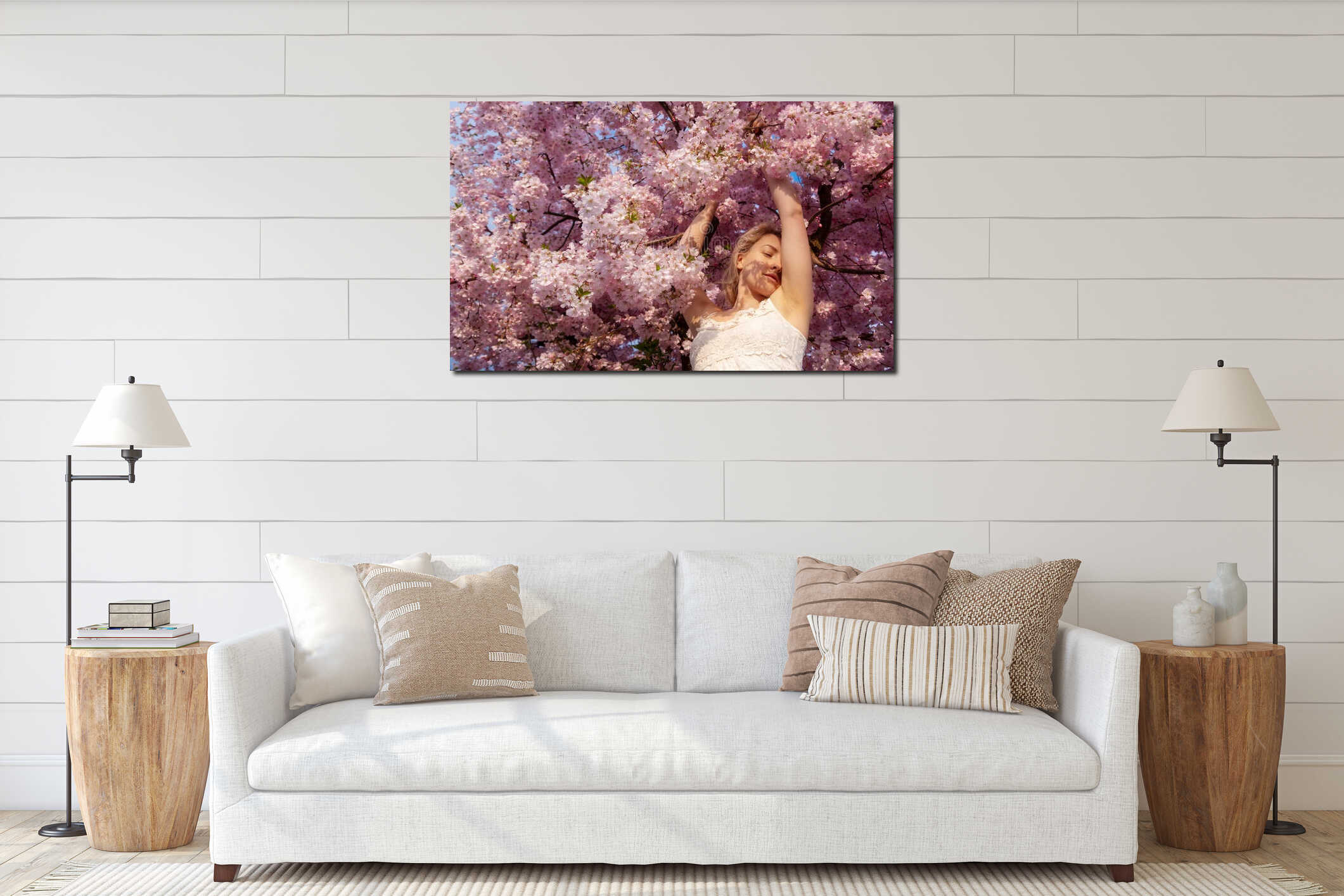 Sensual, seductive, portrait of a sexy, young woman in white dress in pink flower tree blossoms in april spring, copy space interior mockup