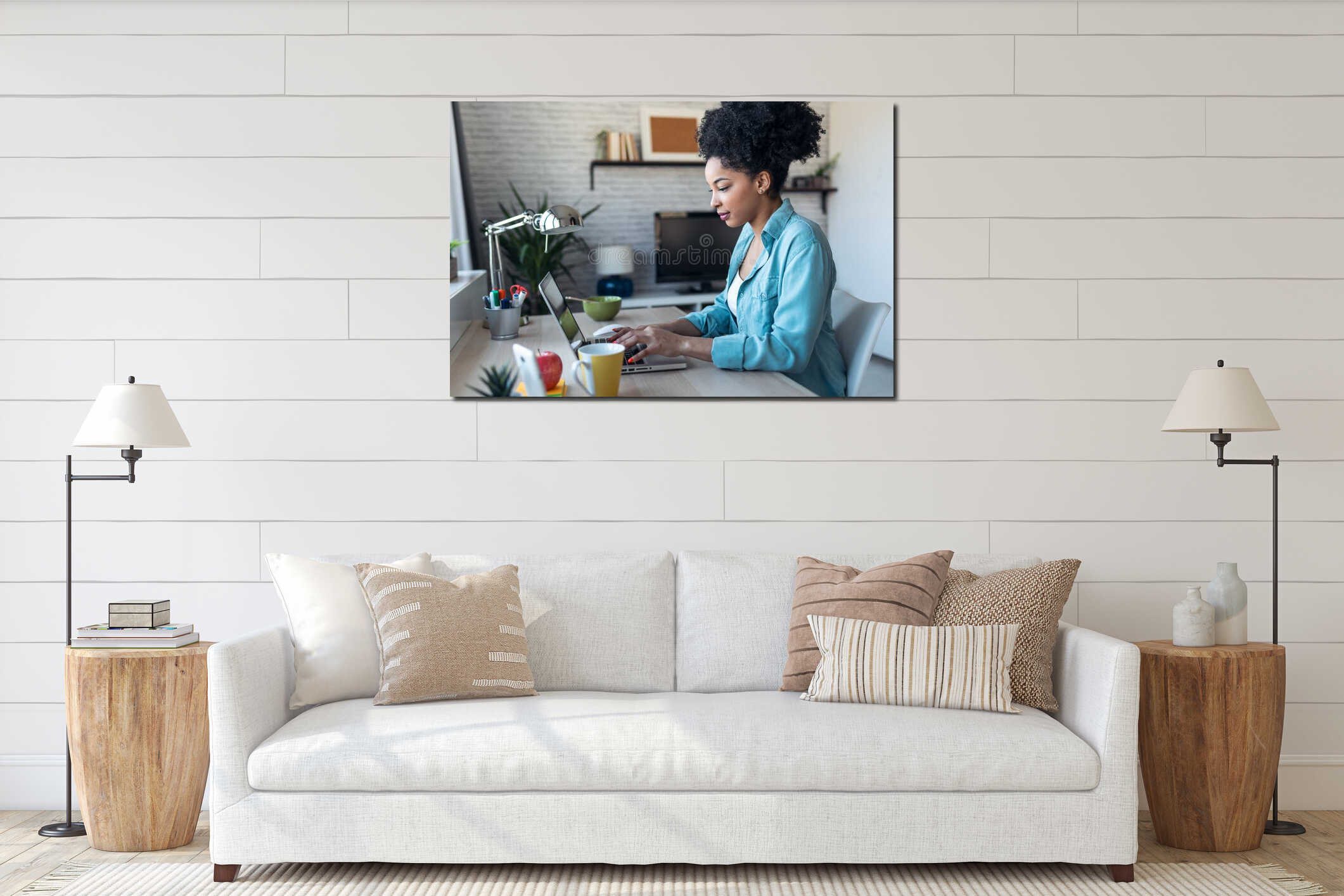 Beautiful young afro business woman working with laptop sitting in the office at home interior mockup