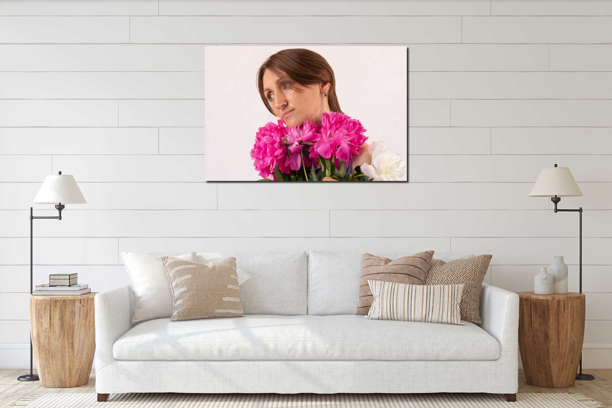 Portrait of a thoughtful young woman with a bouquet of peonies close-up. interior mockup
