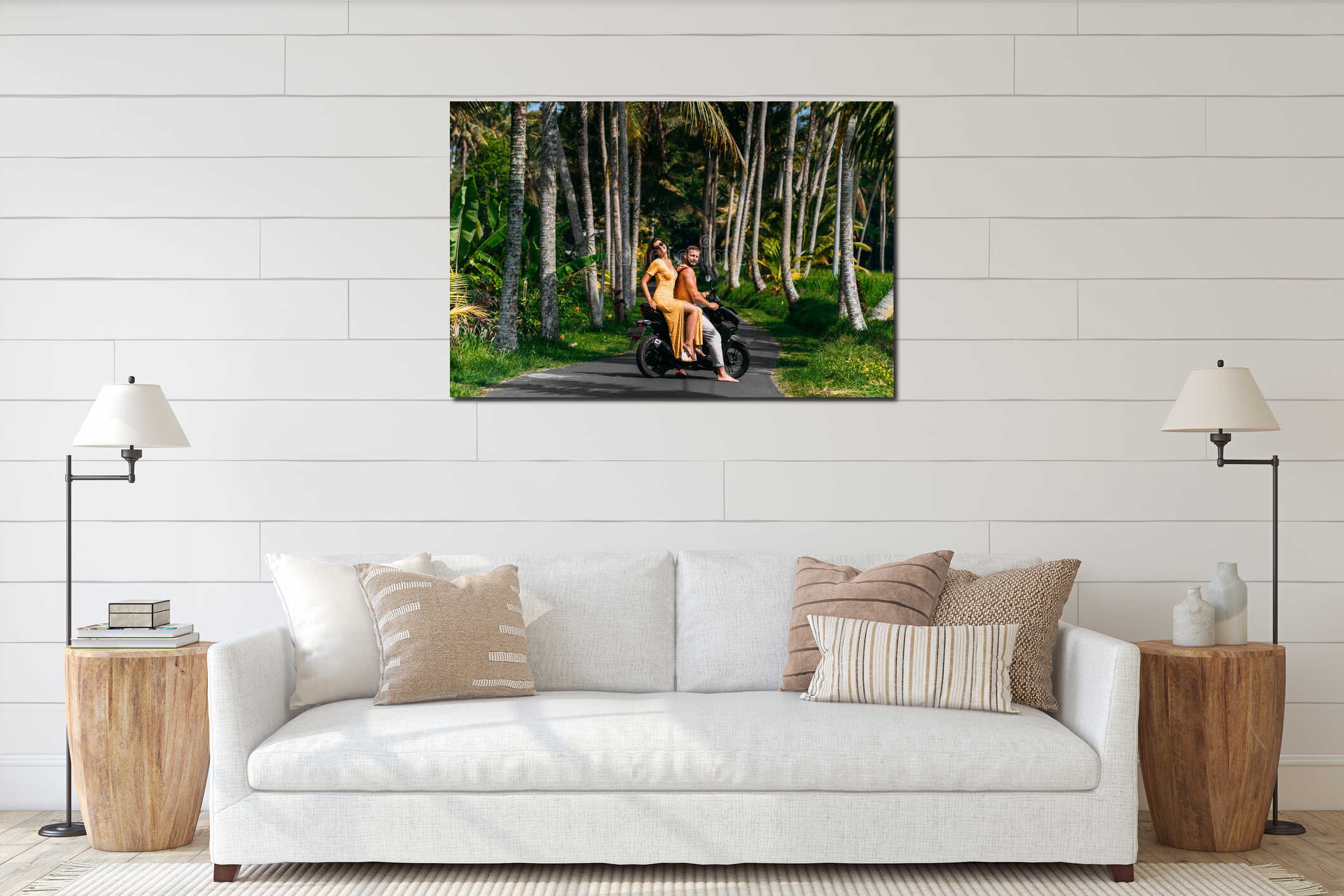 A happy young couple rides a scooter among the palm trees. A beautiful young couple is traveling on a scooter in Sri Lanka. interior mockup