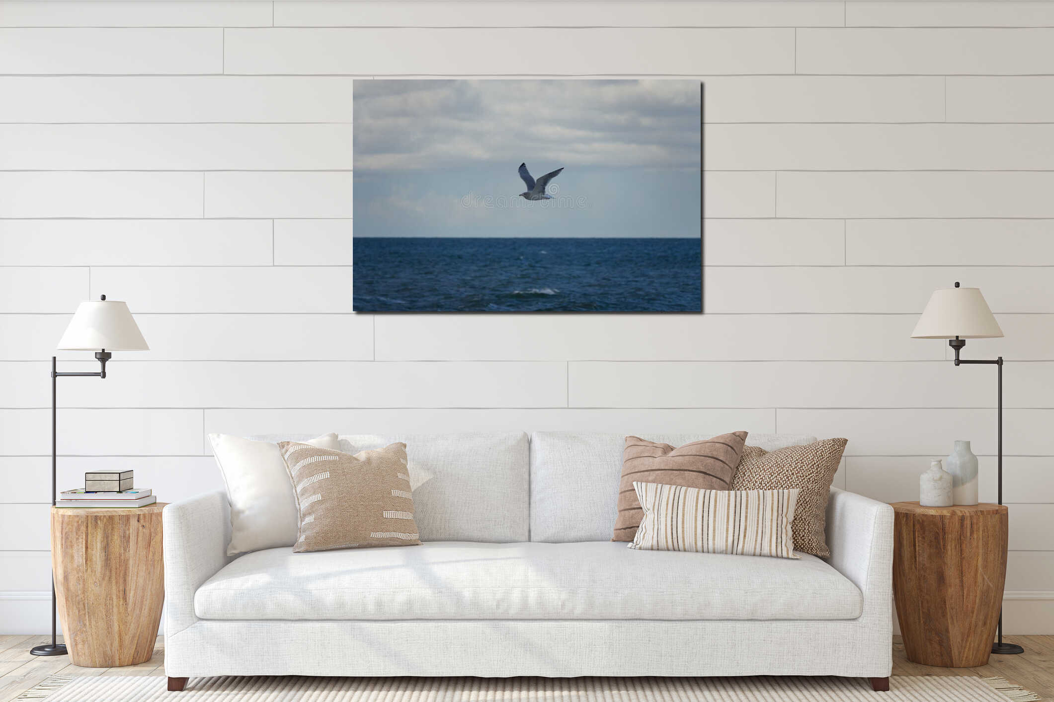 Scenic view of a lone seagull flying above the sea interior mockup