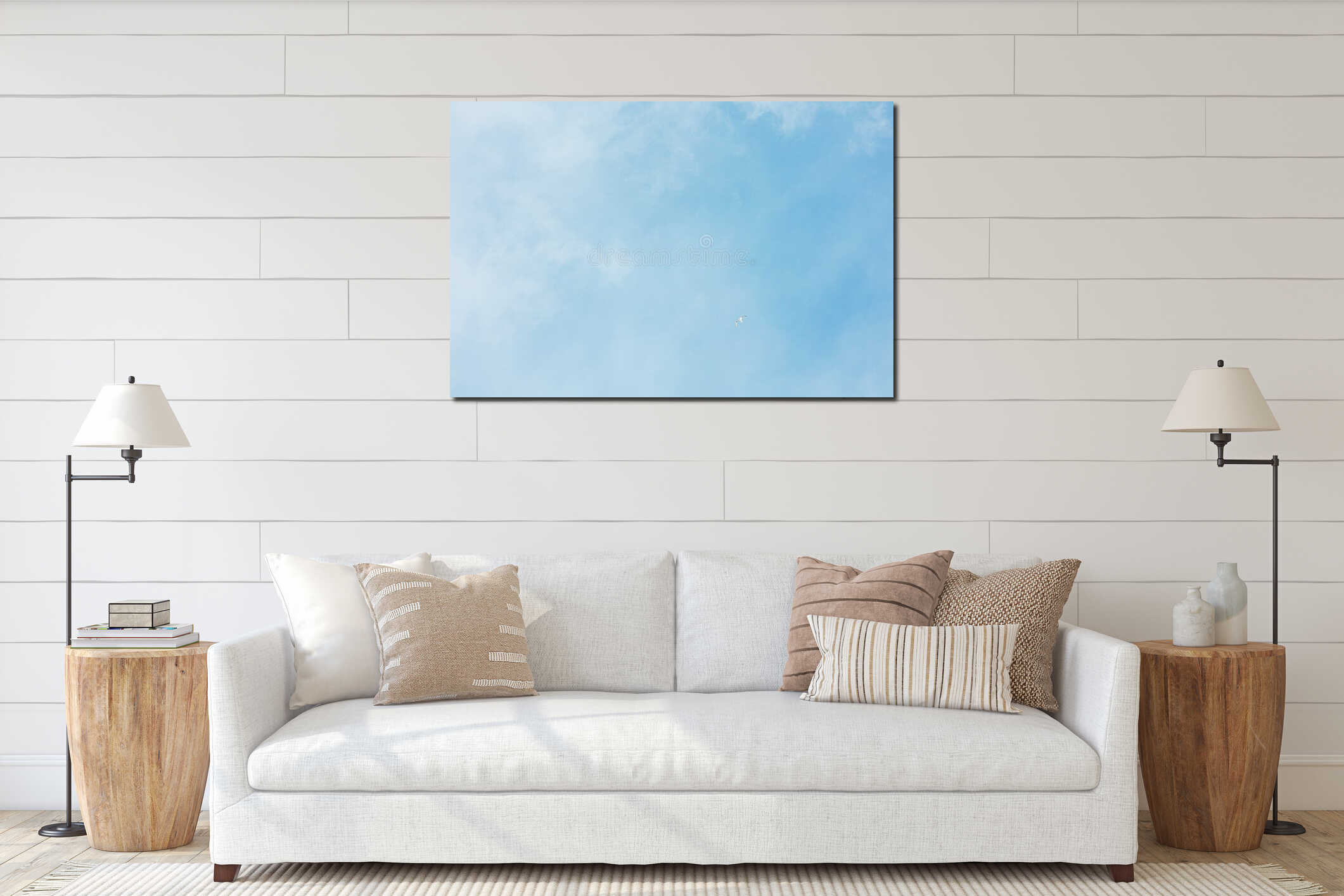 Little Ivory gull flies in the blue light cloudy sky. Minimalism. interior mockup