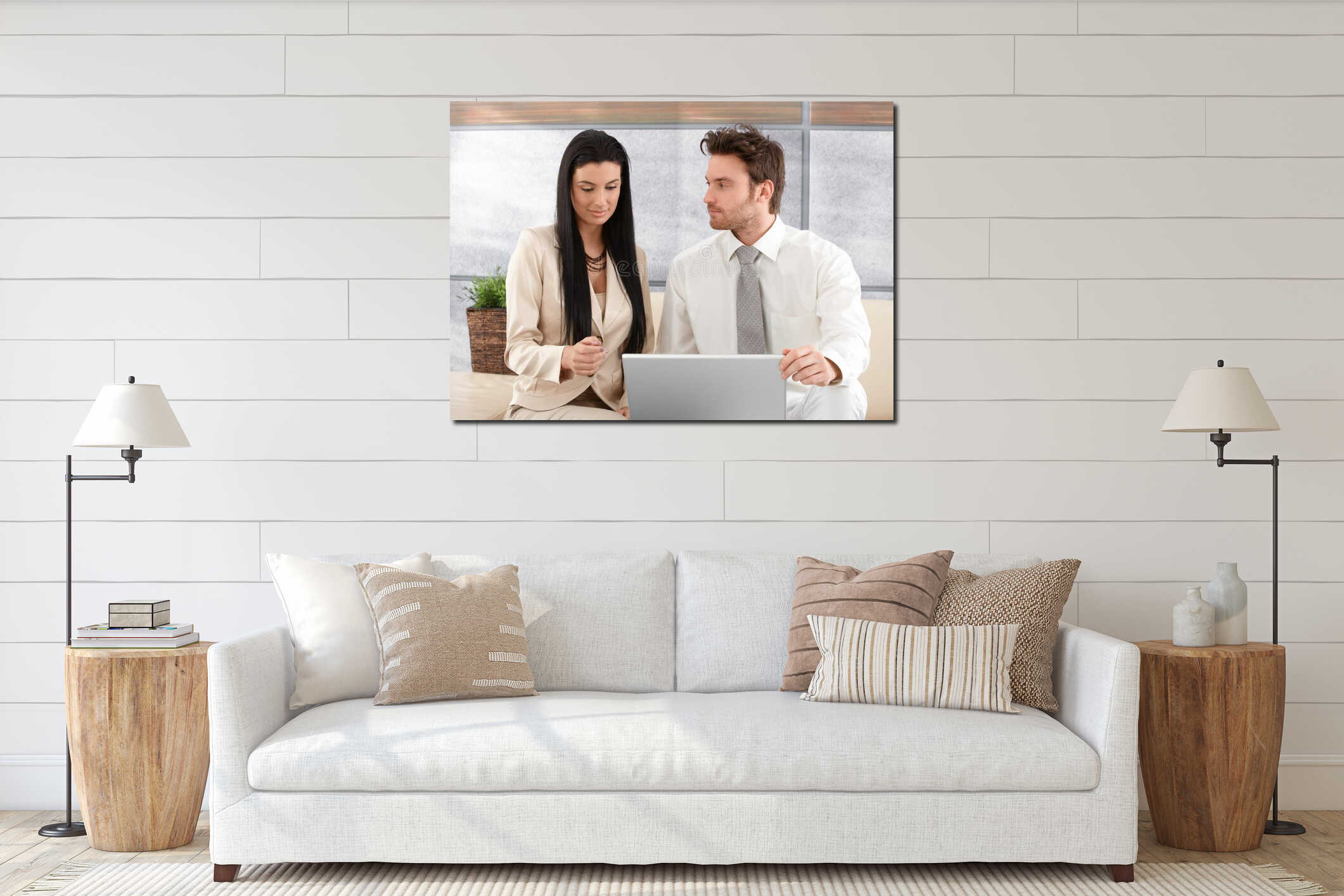 Young colleagues working on laptop interior mockup