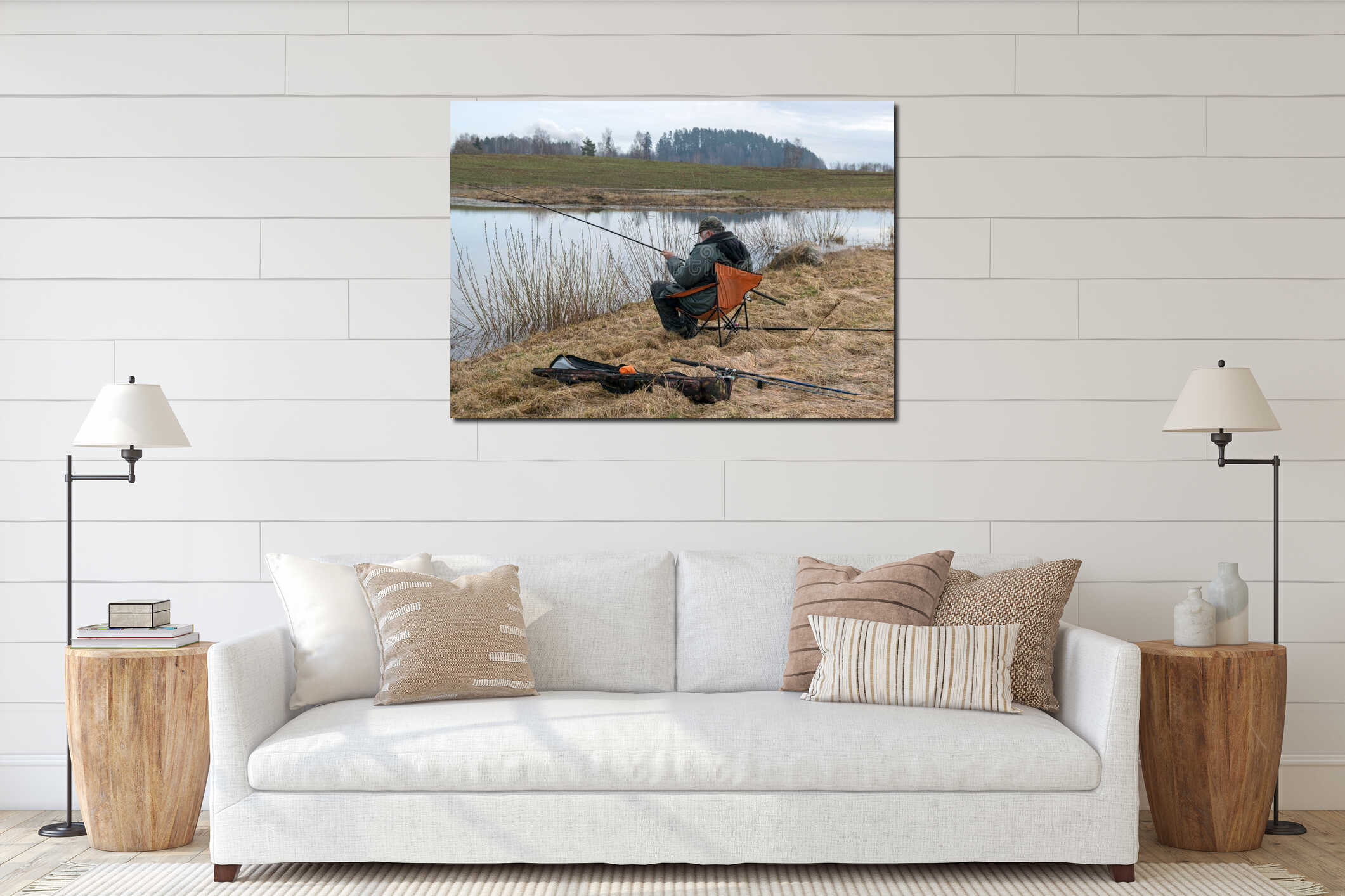 Fisherman fishing on the shore of the lake, amateur carp fishing, fishing as a hobby, early spring interior mockup