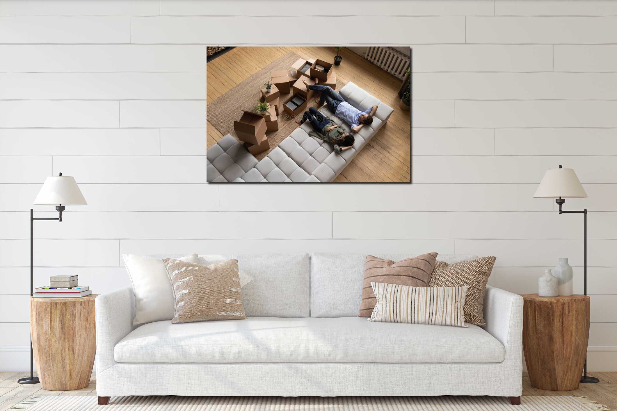 Top view happy couple relaxing on couch on moving day interior mockup
