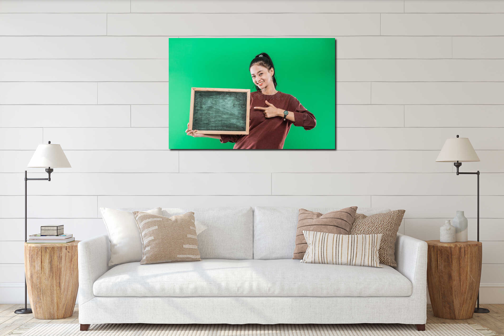 portrait woman holding and pointing beside on a blank blackboard with smiling happiness interior mockup