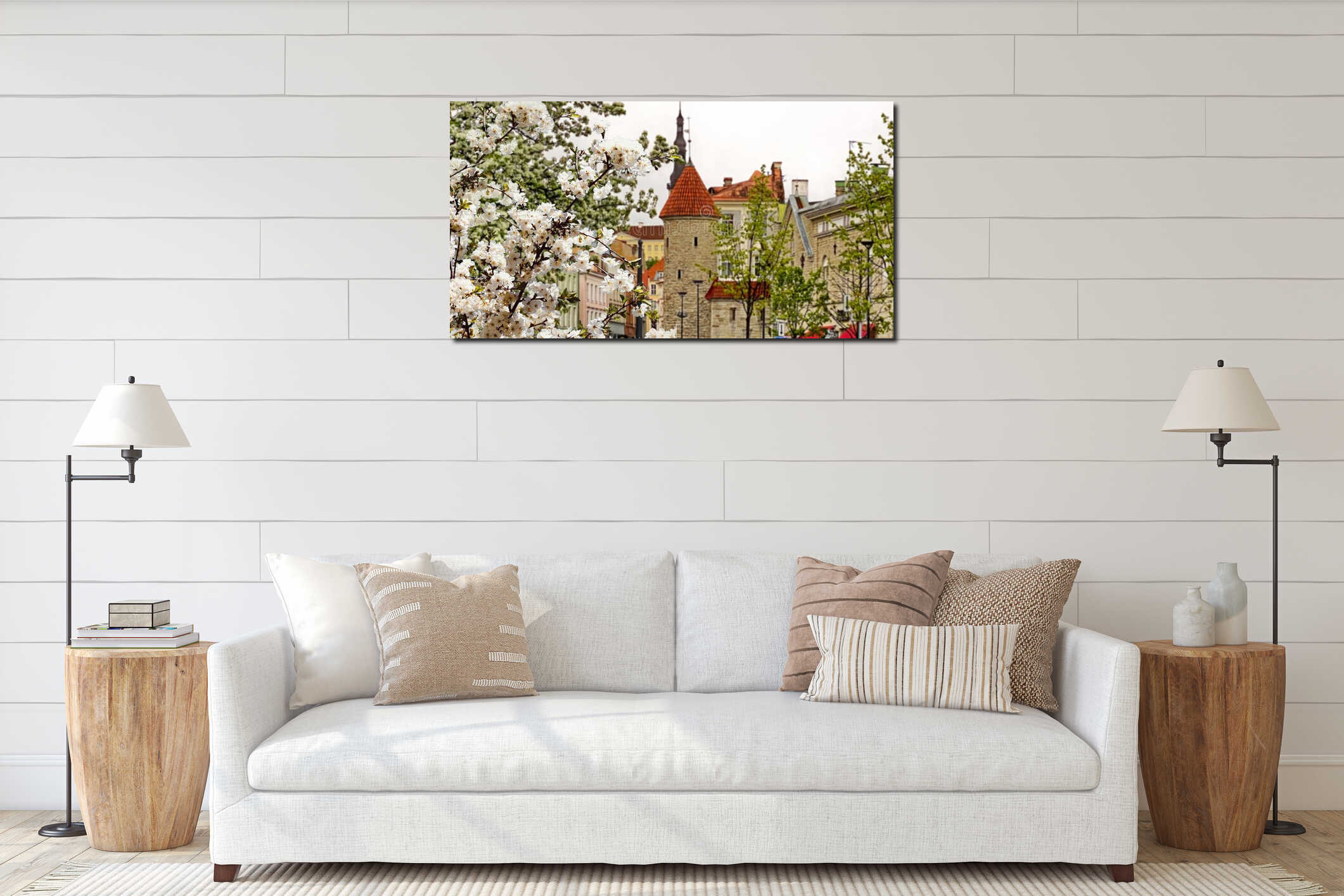 Spring in Tallinn old town blooming apple tree on front medieval city red ruff tower panoramic Estonia Europe interior mockup