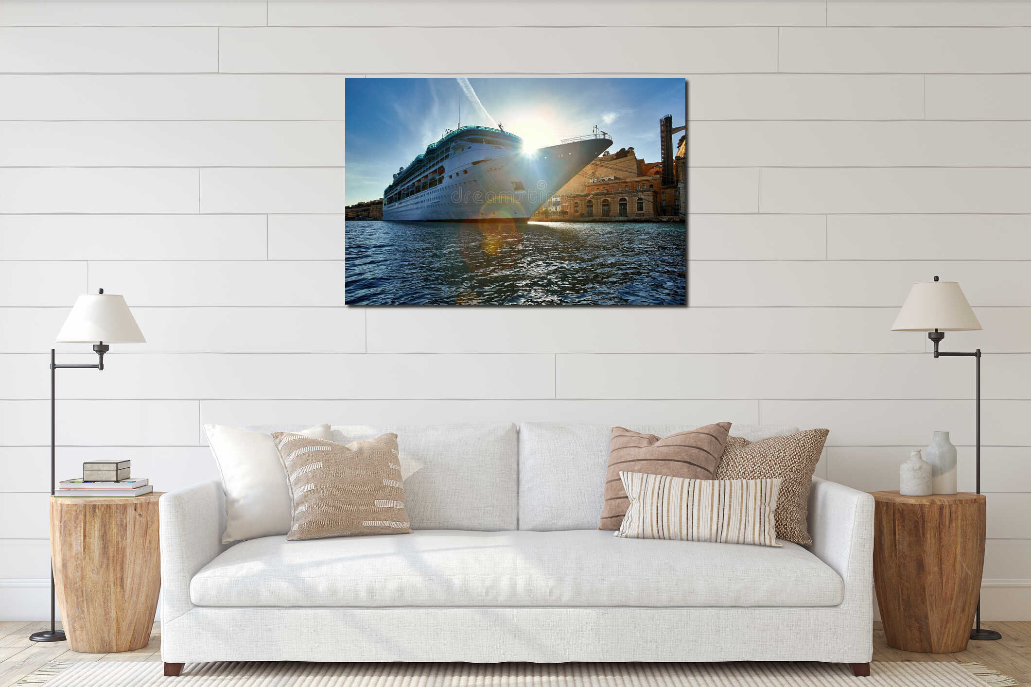 Ocean liner in harbour of ancient Valletta. View from the water level on huge, white ship against sun. Malta interior mockup