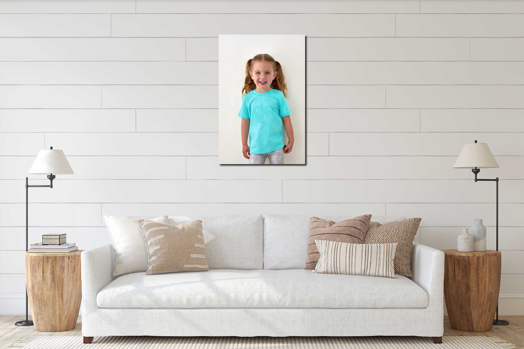 Happy little girl in blue shirt standing in studio interior mockup