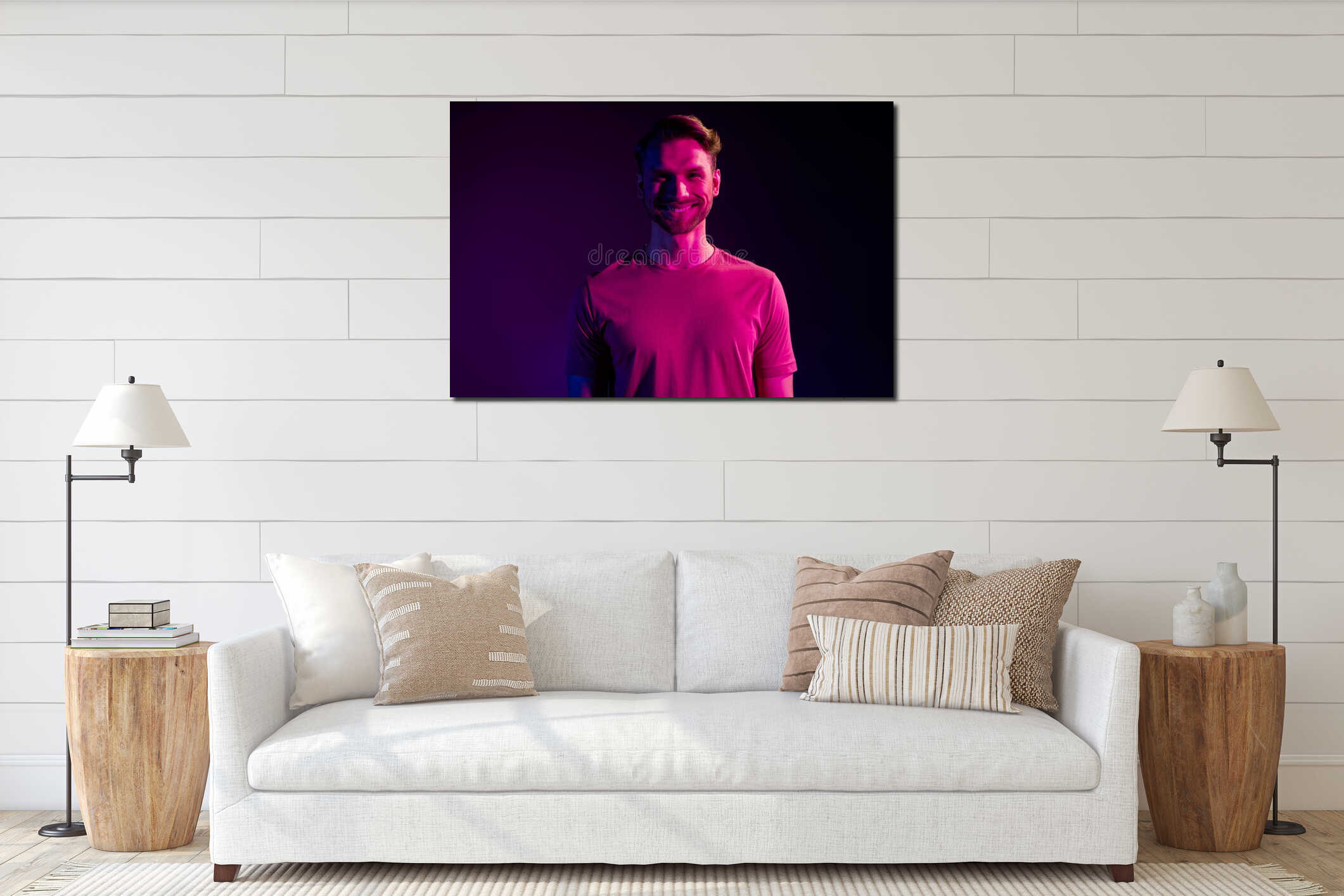Portrait of attractive cheerful content guy at night club isolated over dark neon light violet color background interior mockup