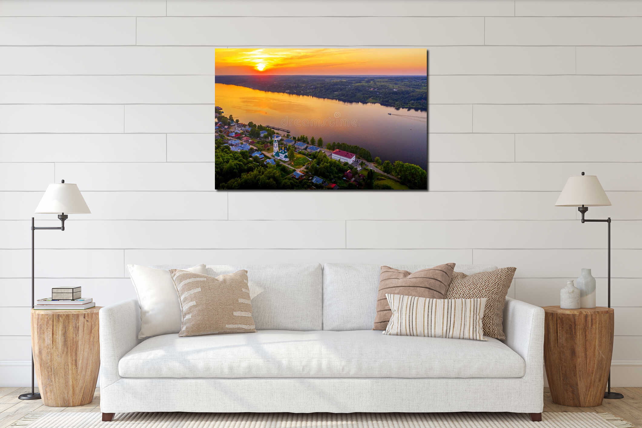 Aerial drone view of ancient russian town Ples on the Volga river with colorful sunset interior mockup