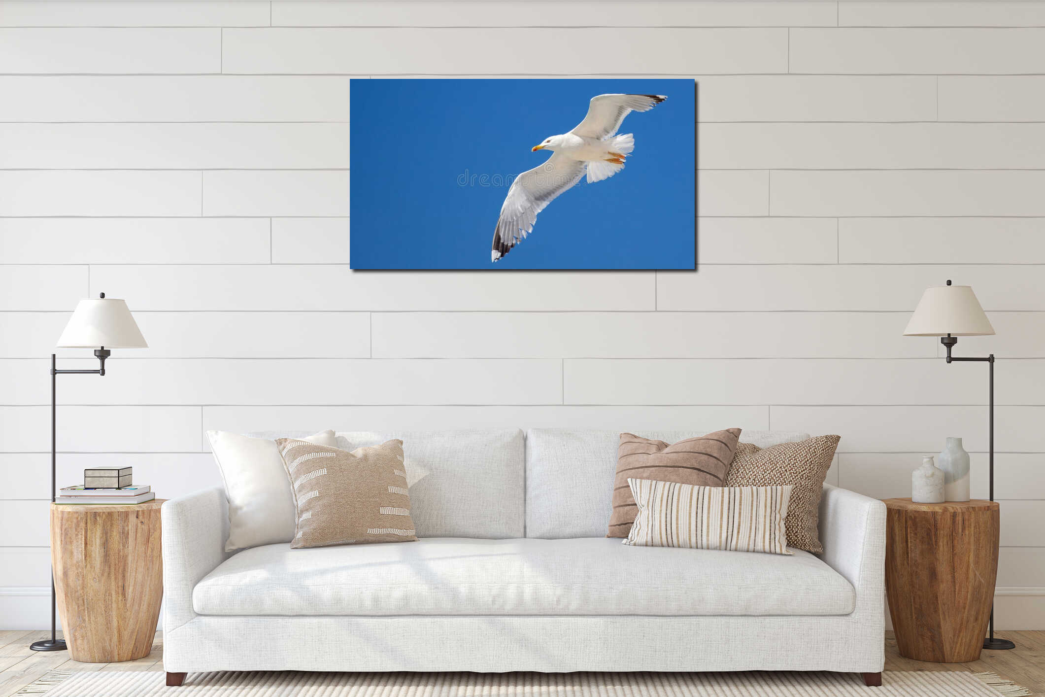 Sea gull flying with open wings, clear blue sky background interior mockup