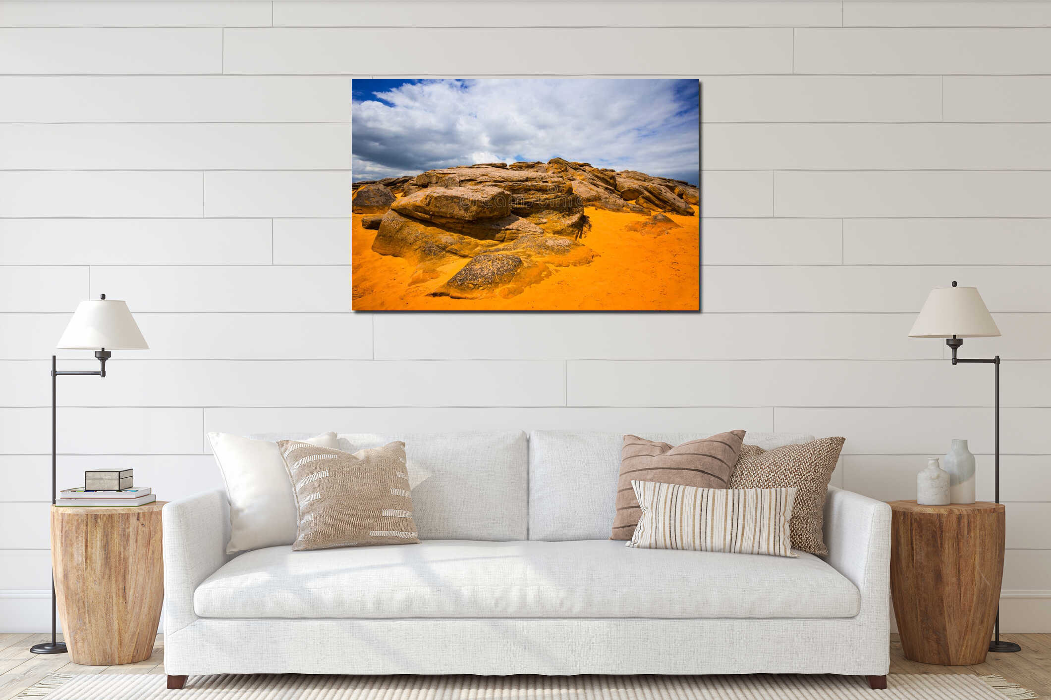 Heap of huge stones on sand interior mockup