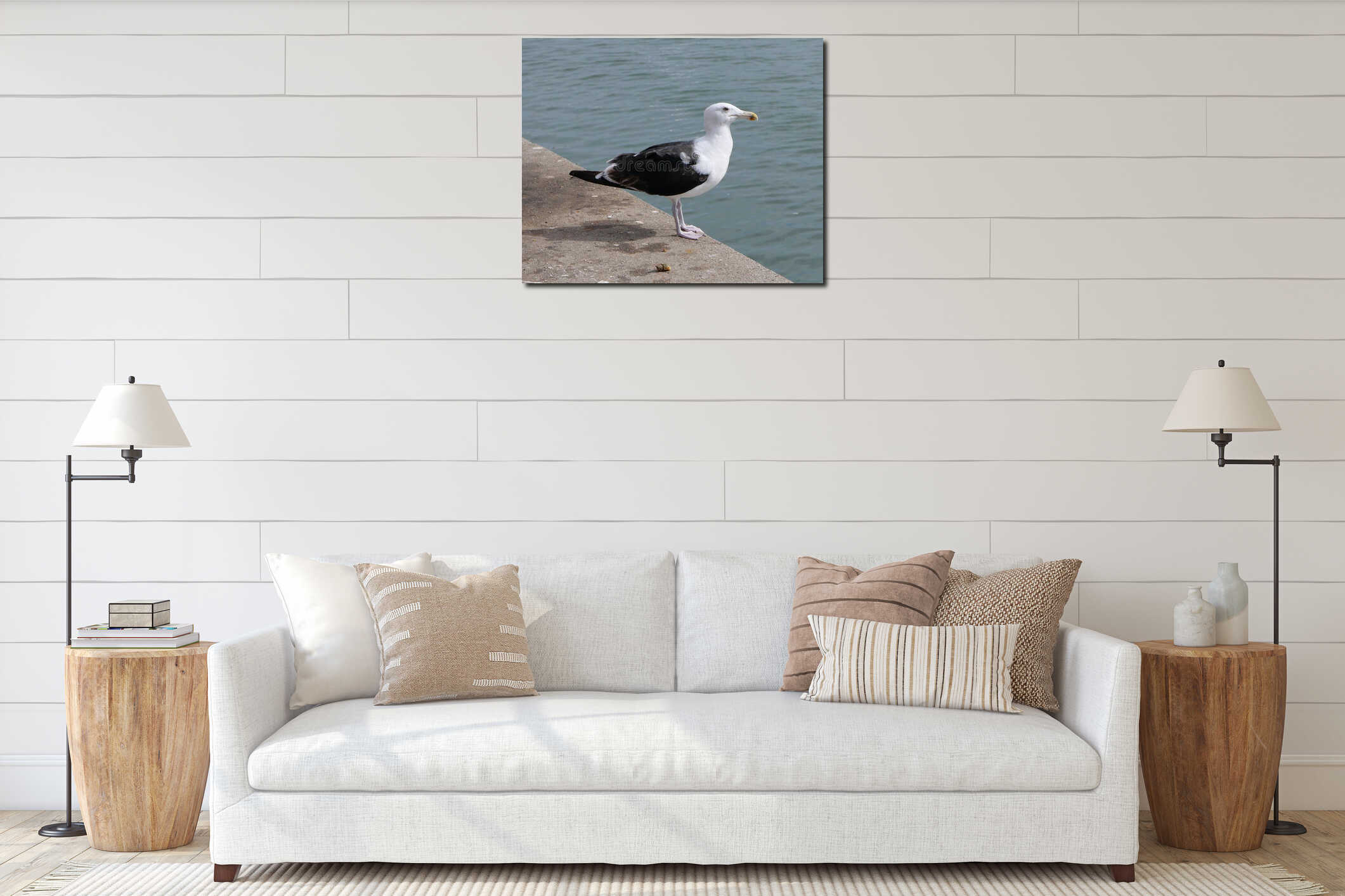 Black and white seagull standing on harbourside with space for copy interior mockup