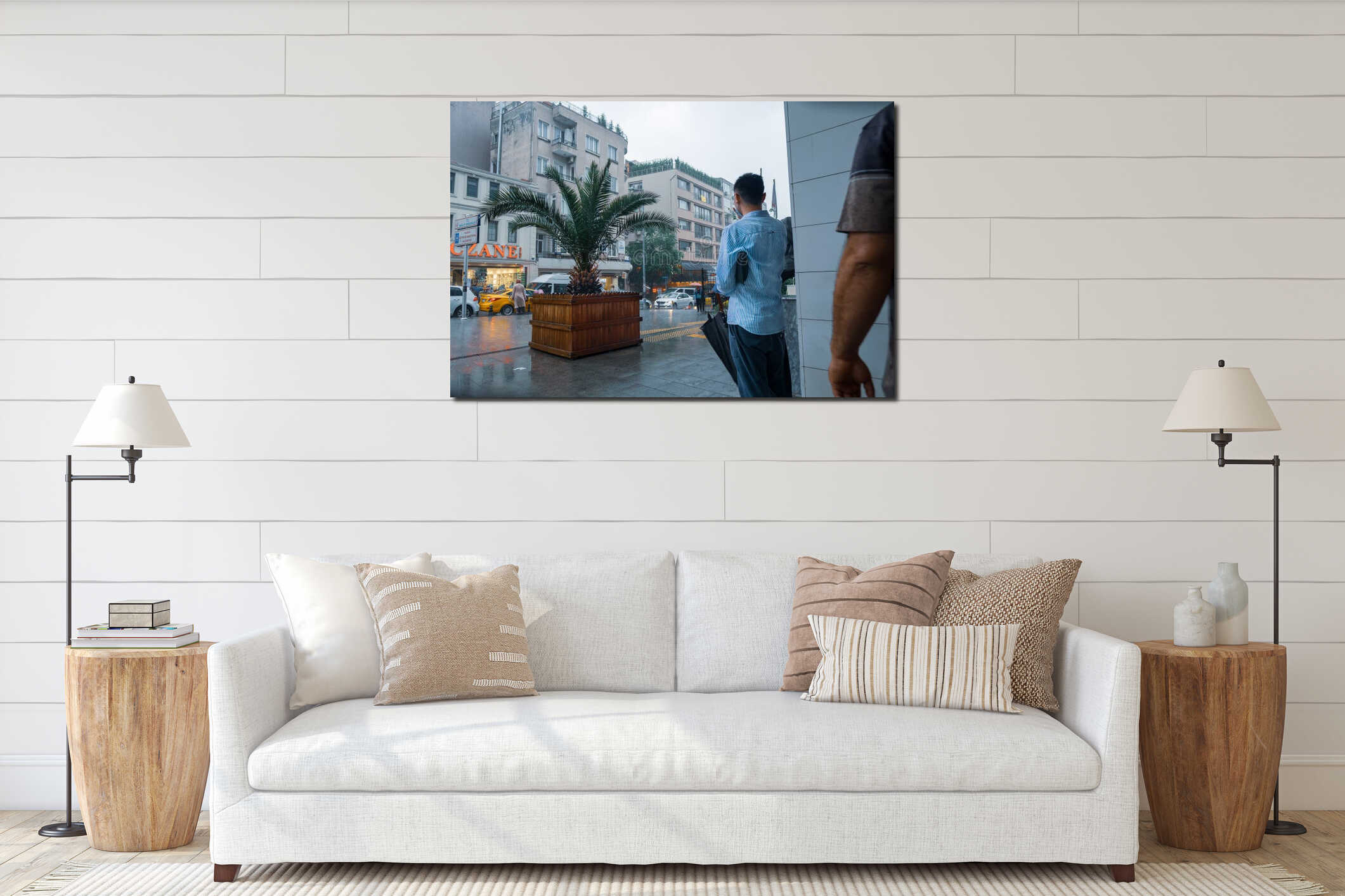 A male person standing in front of a column of building while raining a heavy rainfall outside in Taksim with a lot of cars interior mockup