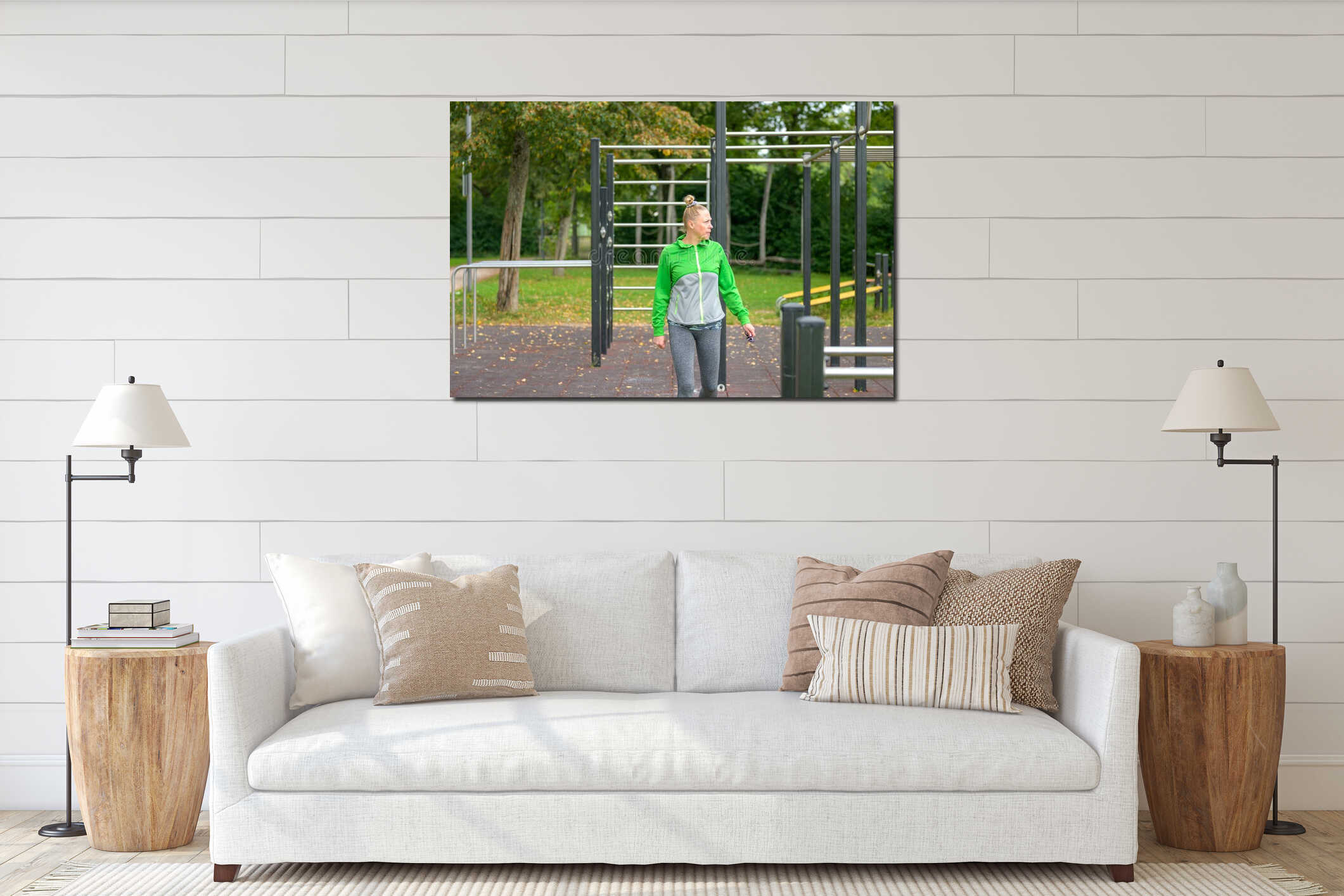 Athletic middle-aged woman looking pensively at the camera interior mockup