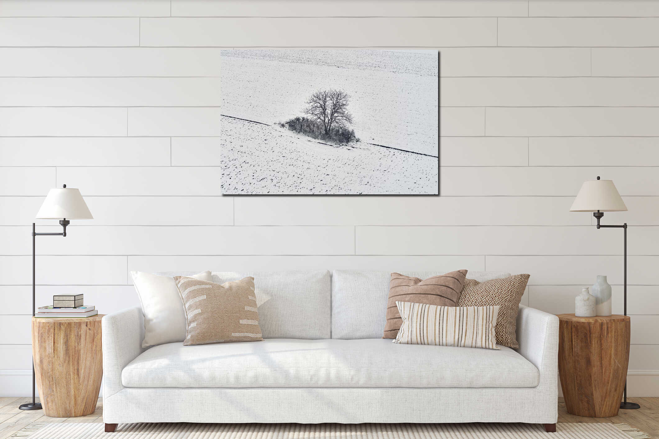 Aerial view of lonely tree in field covered with snow in cold winter morning, drone pov interior mockup