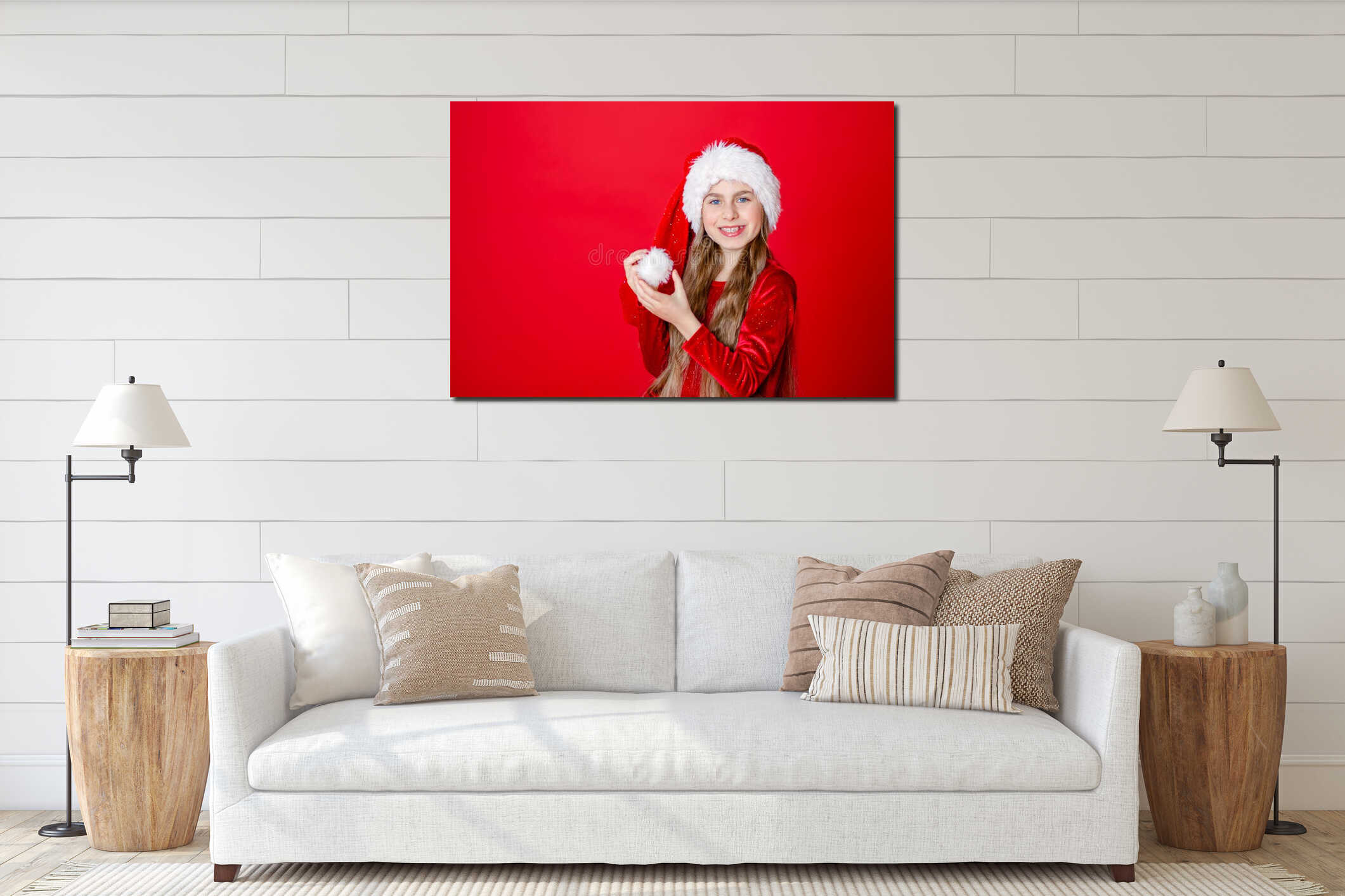Portrait funny cheerful girl in a Santa hat and Christmas balls,  on a bright red background interior mockup