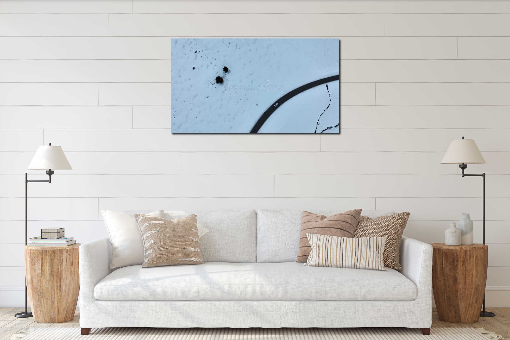 Aerial drone shot of a road with a moving car in a lonely winter landscape interior mockup