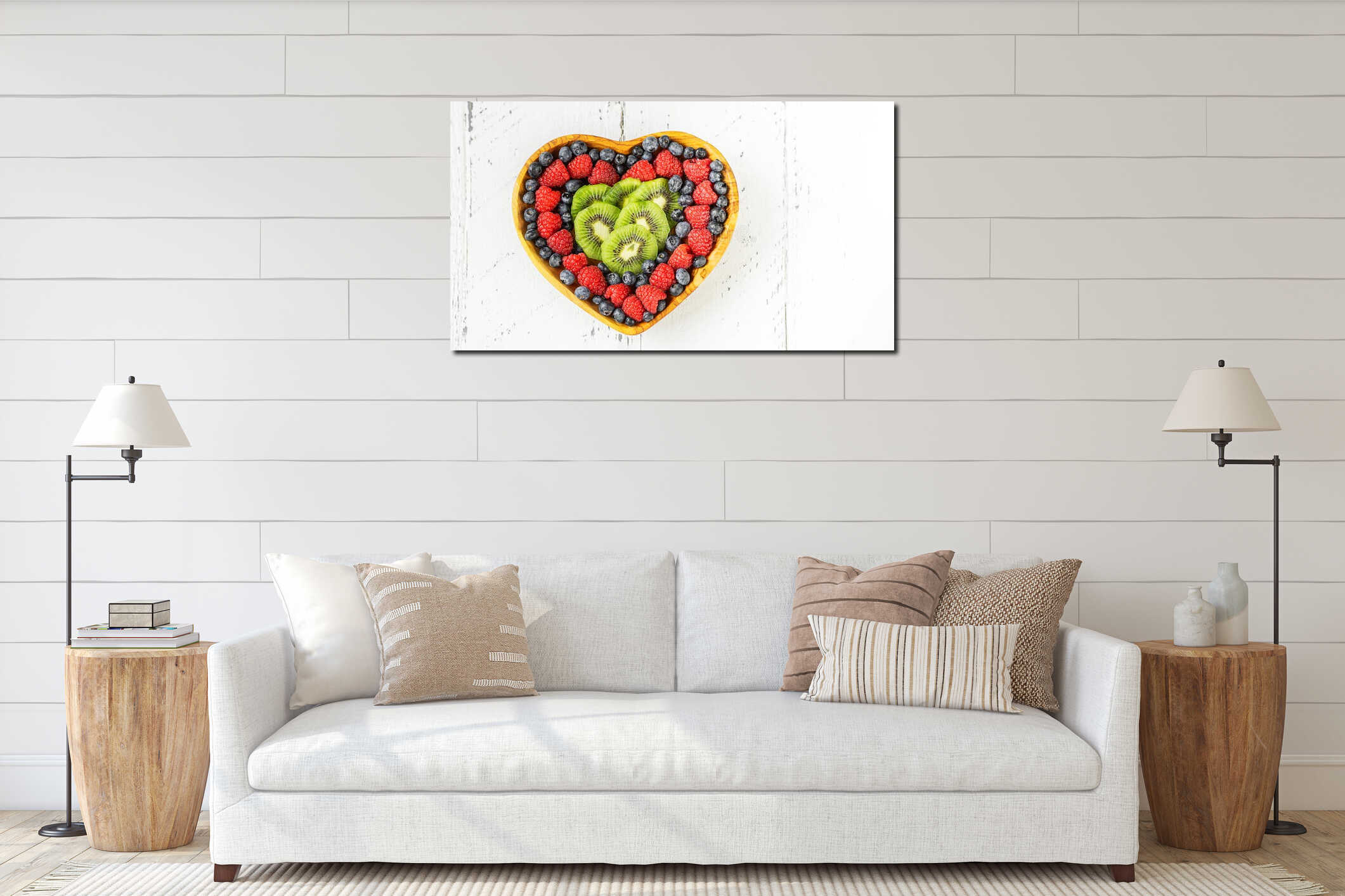 S.Valentine's Day concept. Mix of berries and kiwi in a heart shaped on white wooden background interior mockup