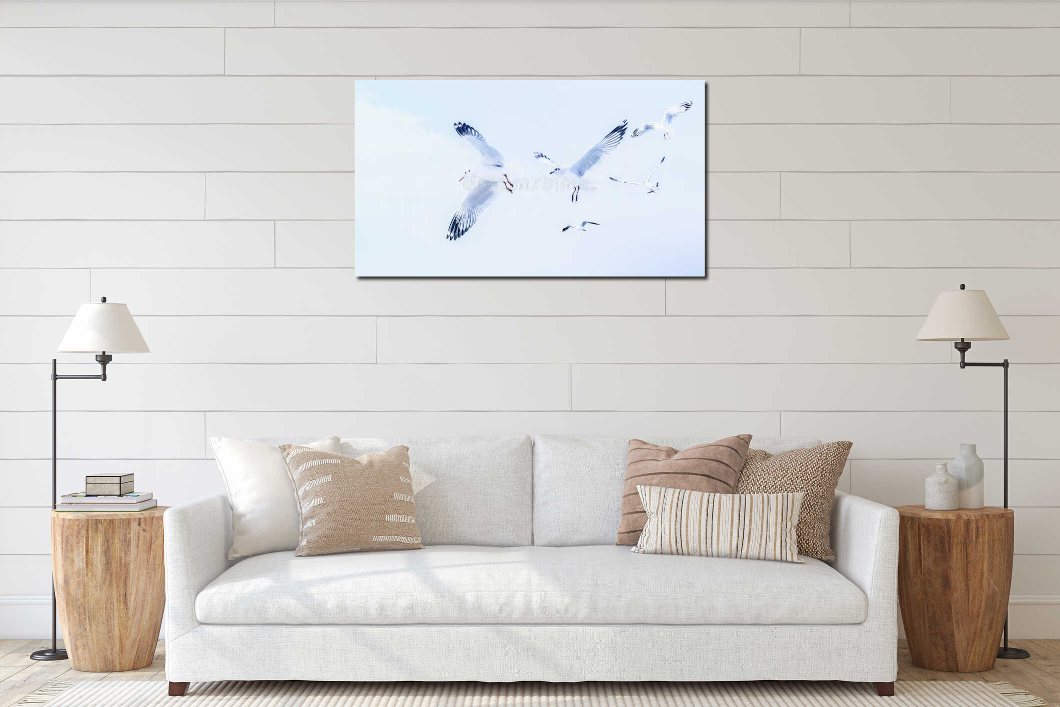 Flock of seagull birds flying together over blue sky interior mockup