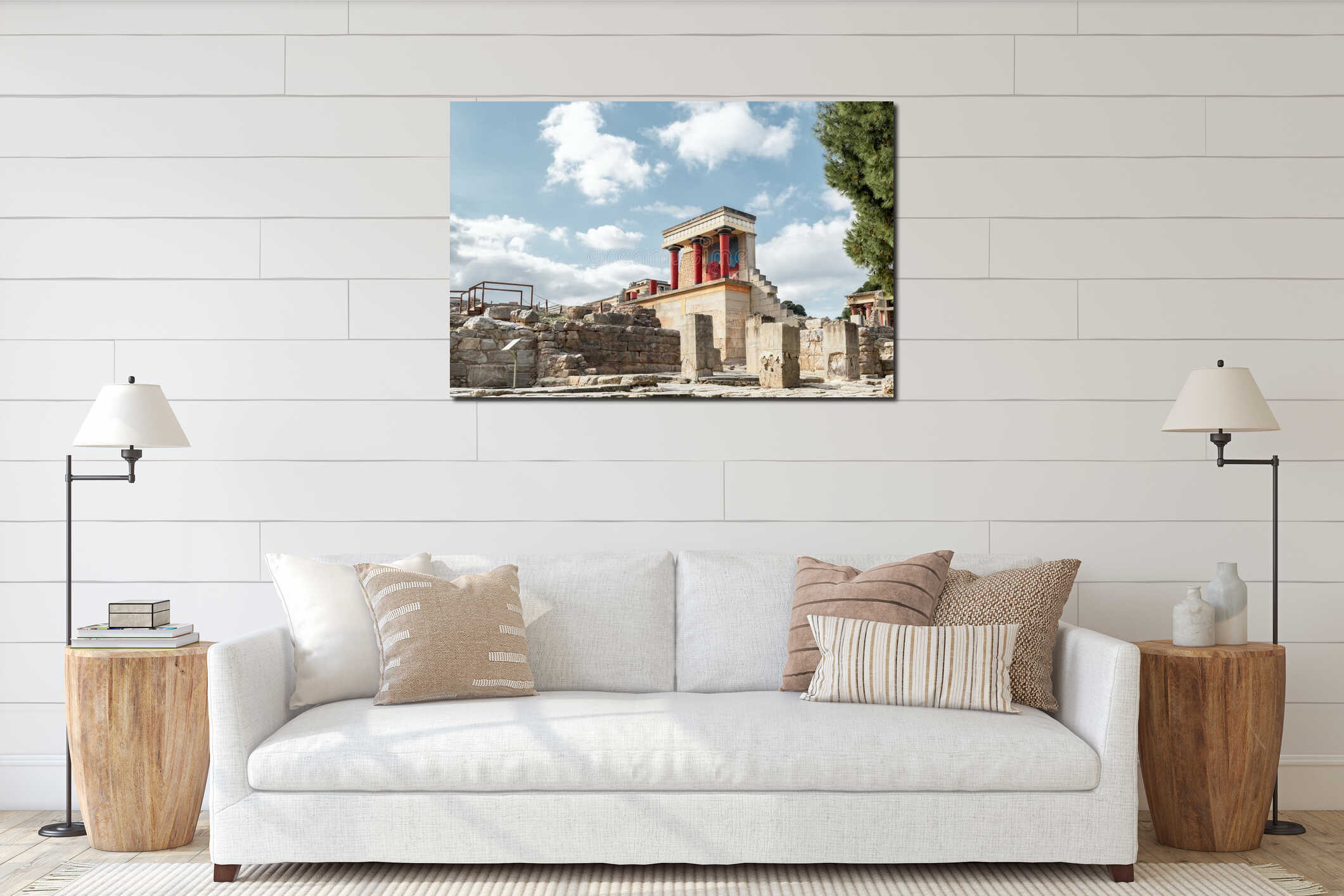 Minoan palace Knossos at Heraklion, Crete island, Greece. Bull fresco and three red columns against dramatic cloudy sky interior mockup