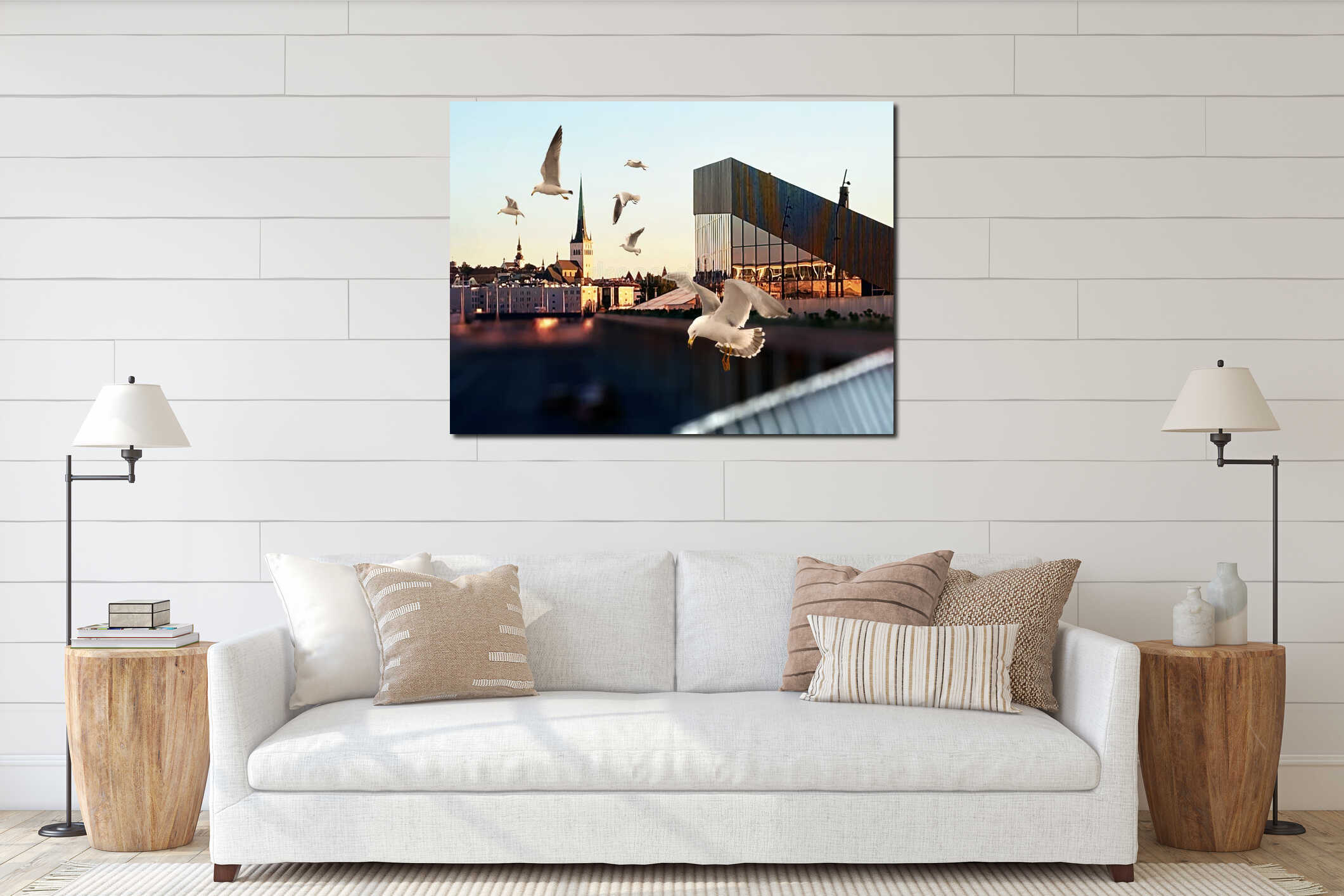 Sunset old town Tallinn panorama chearch ruff medieval houses on horizon and on front seagull fly promenade in harbor Baltic sea E interior mockup