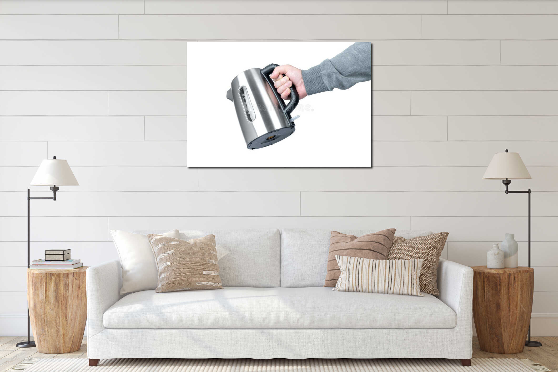 Male hand holds an electric kettle, isolated on white background. File contains a path to isolation interior mockup