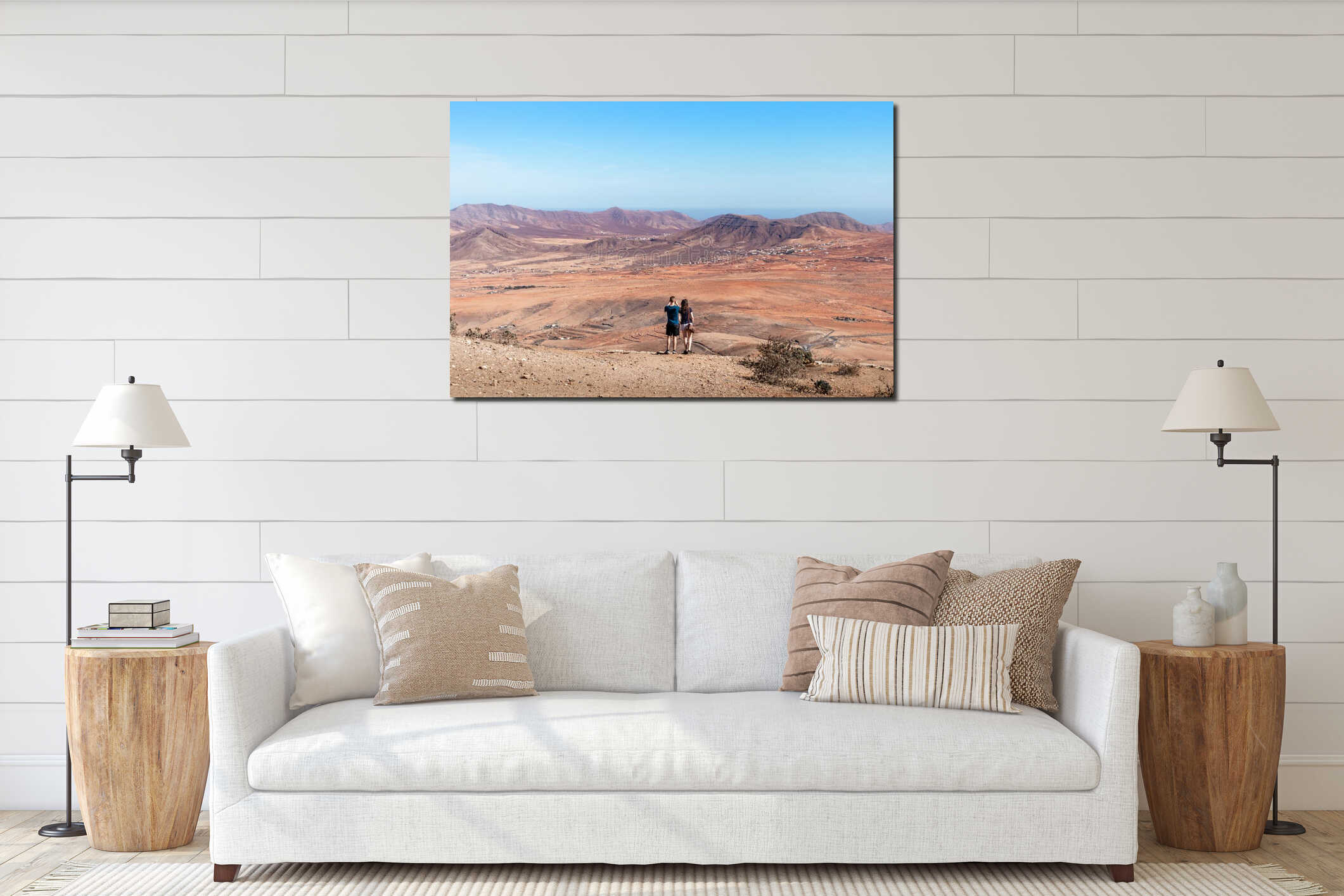 Tourists taking pictures of the dry landscape in Fuerteventura, Canary Islands, Spain interior mockup