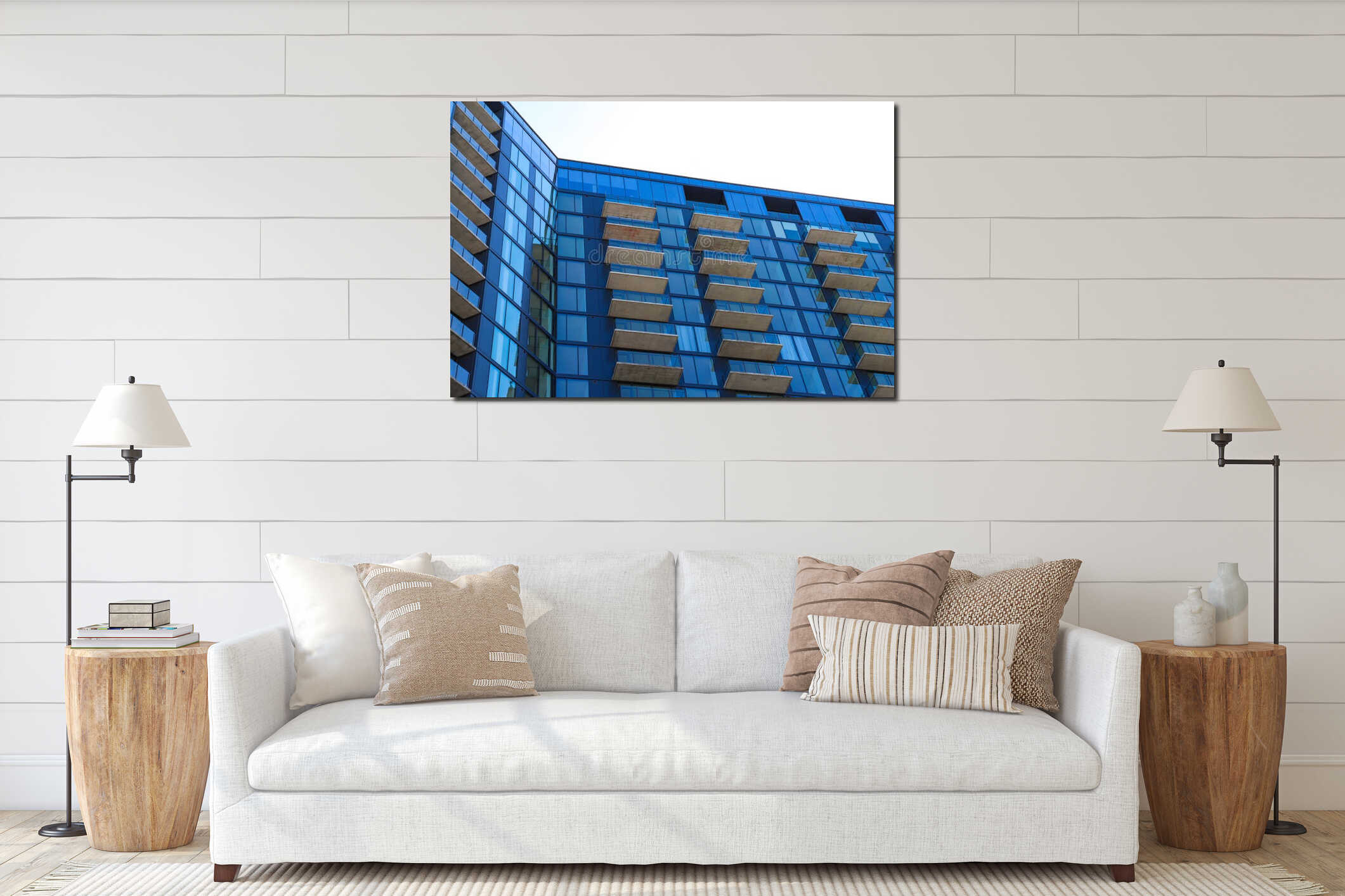 A tall blue glass skyscraper with balconies with clear blue sky in Atlanta interior mockup
