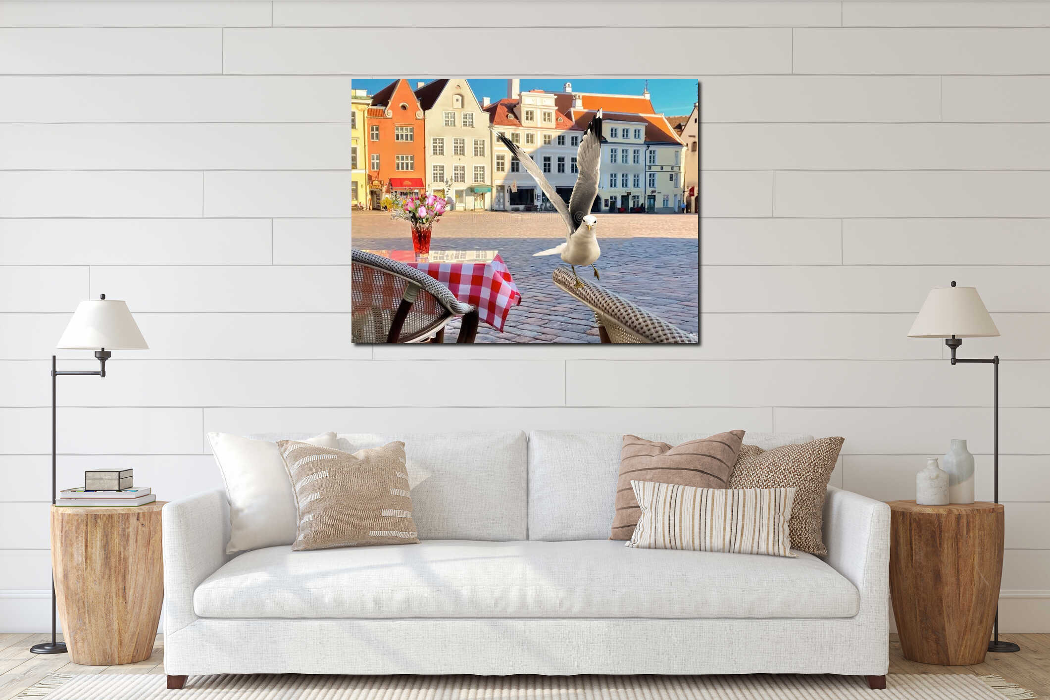 Spring Tallinn old town hall square sunny day and street cafe table with flowers and seagul travel to Estonia interior mockup