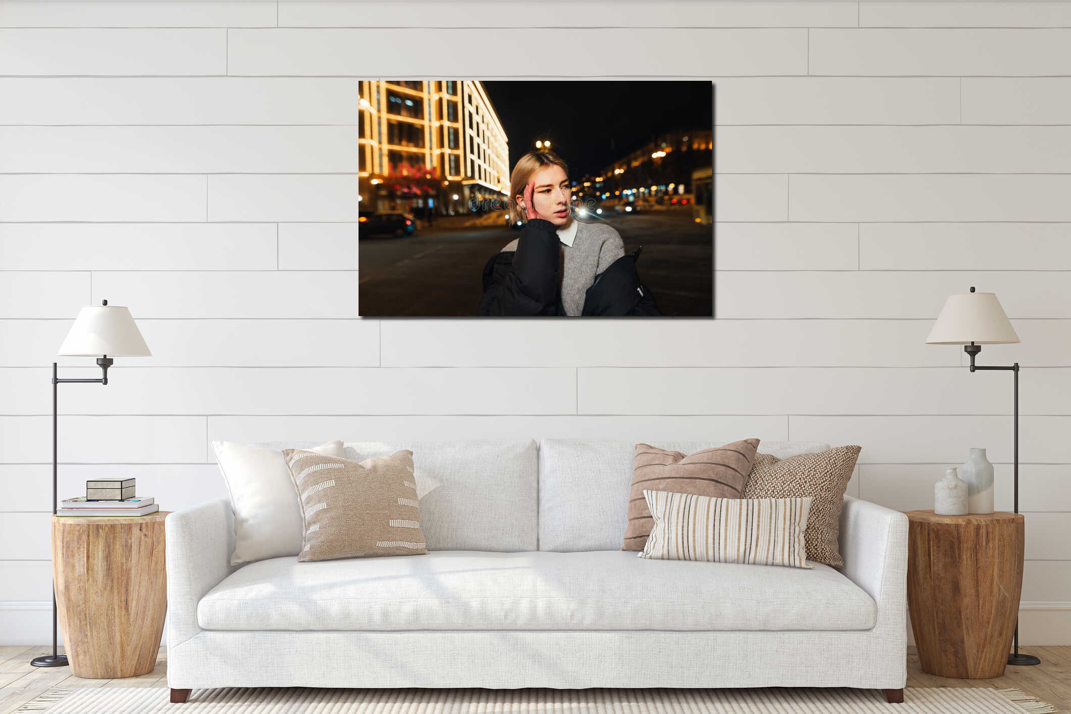 Night portrait of stylish woman in casual clothes posing at camera on evening cityscape background interior mockup