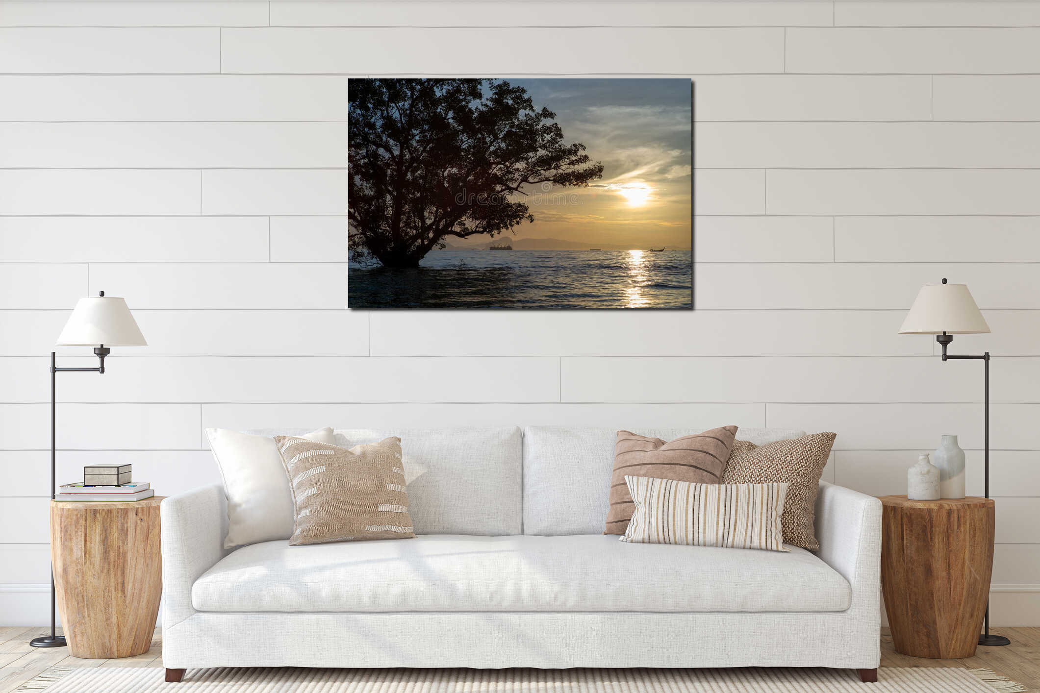 Sunrise in the cloudy sky in the morning with silhouette of big tree in foreground and many boats and ships floating on the sea interior mockup