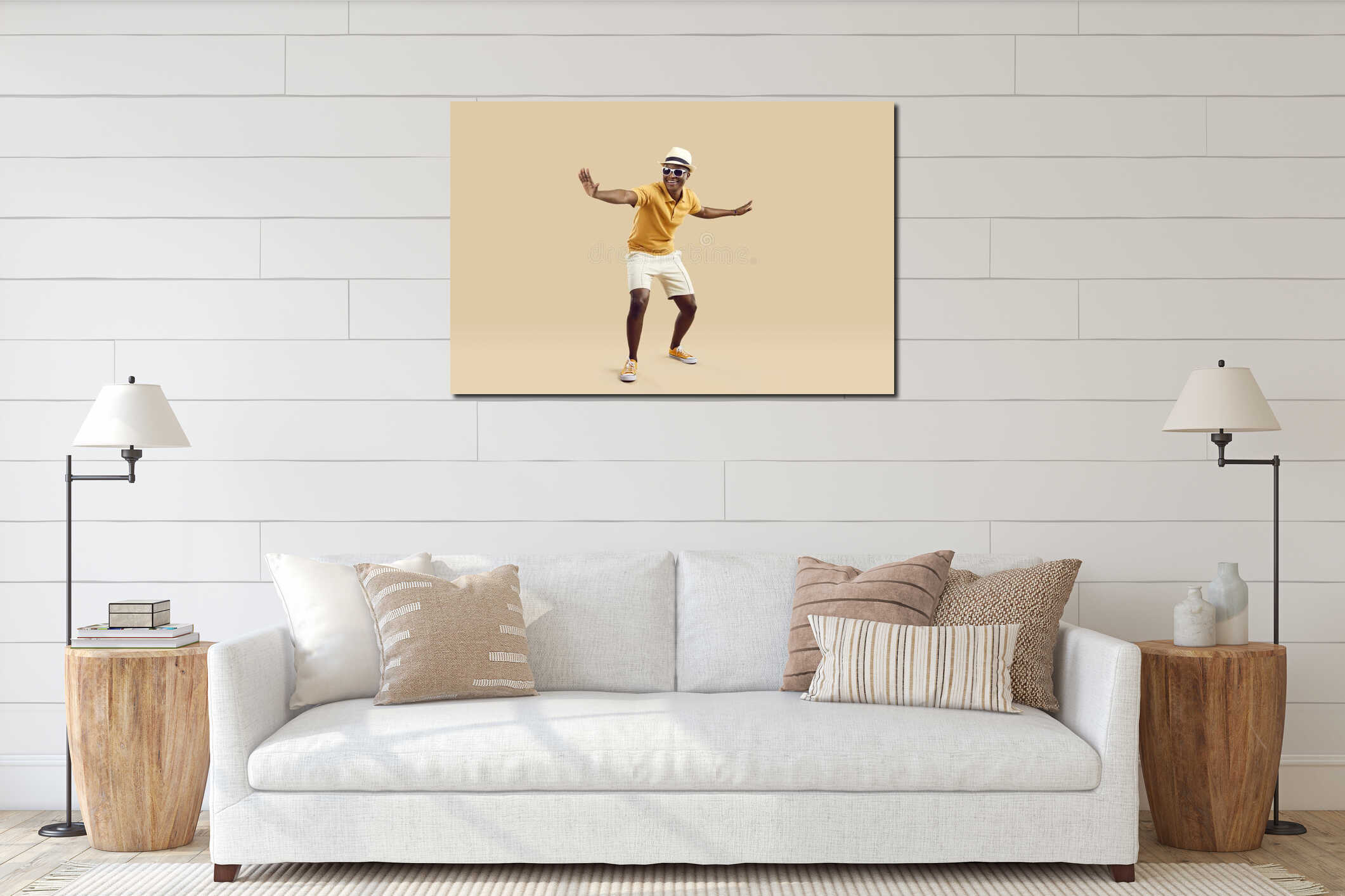 Cheerful stylish african american man having fun dancing on light beige background. interior mockup