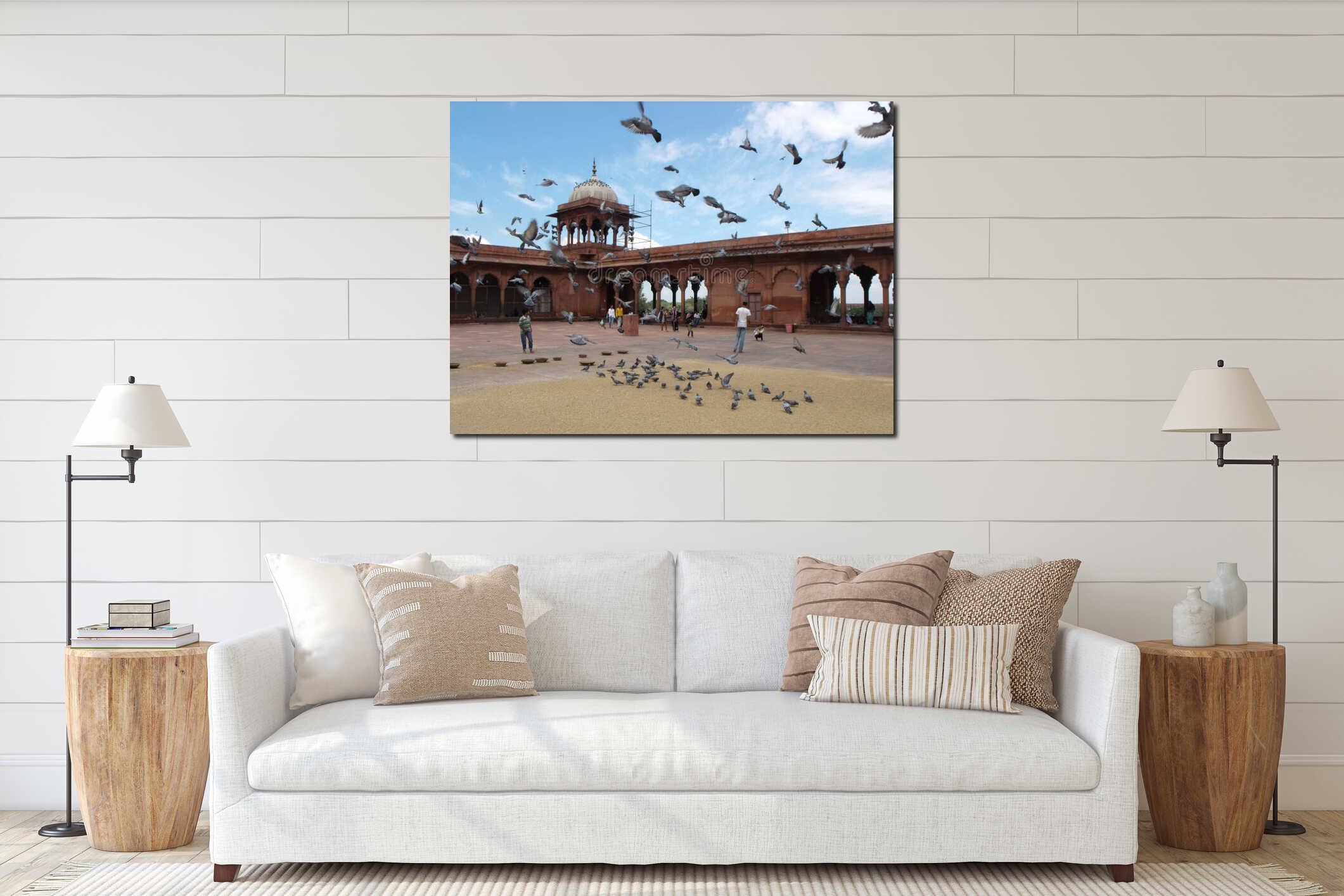 Numerous pigeons fly over the large inner square of the Jama Masjid Mosque in New Delhi, India interior mockup