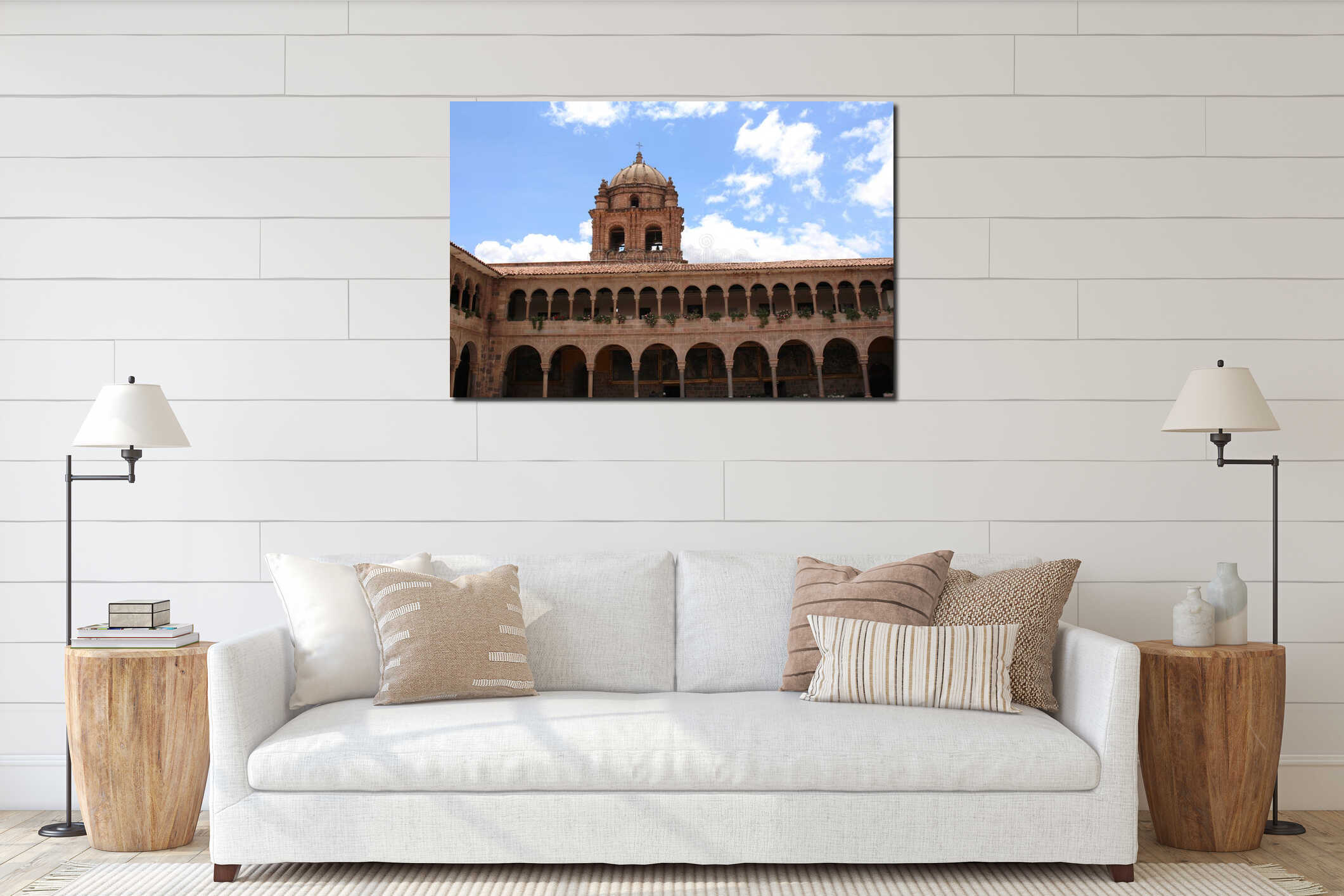 The bell tower atop a two story stone building lined with columns and arches in Cusco, Peru, South America interior mockup